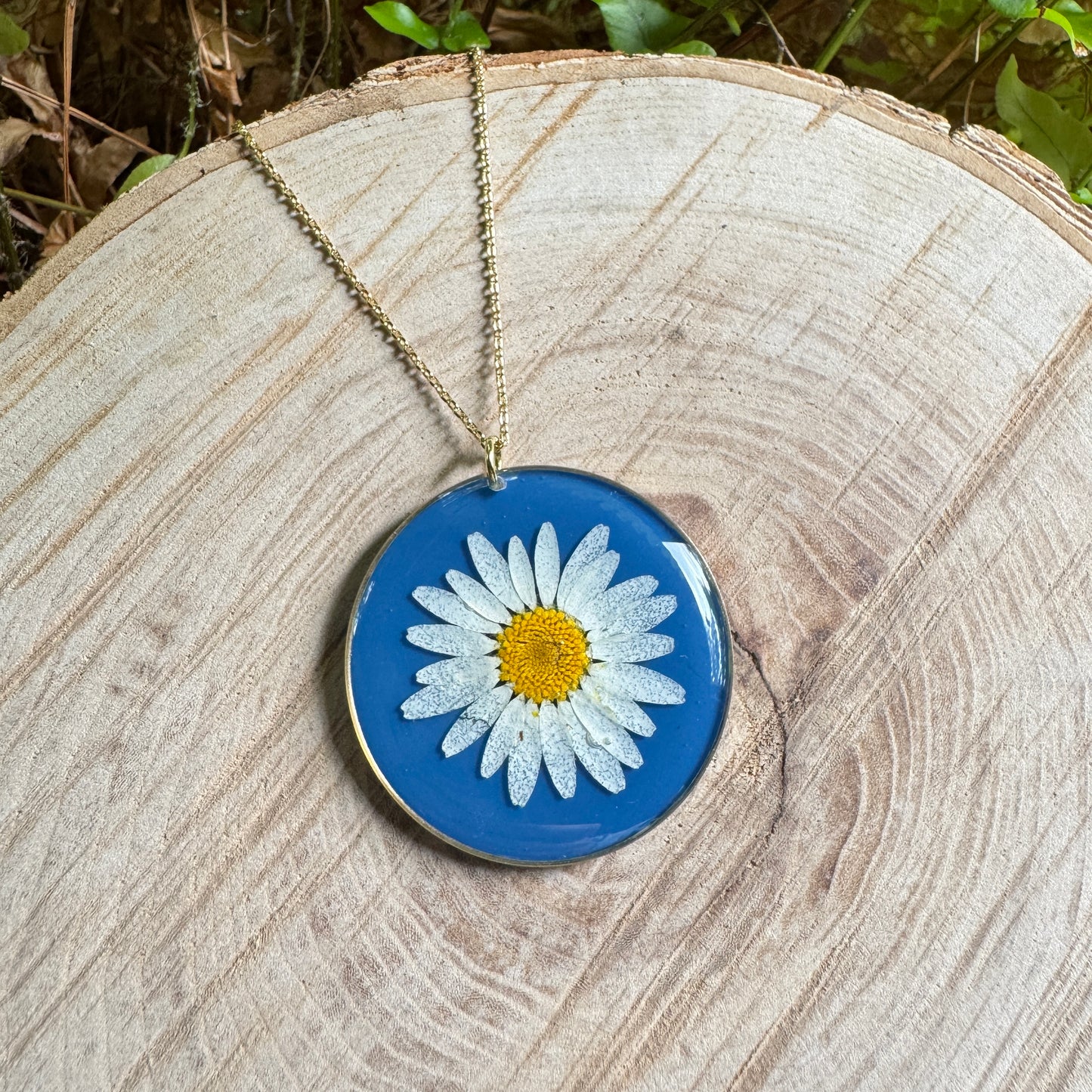 Daisy flower necklace in resin with gold filled bezel and 18-inch chain