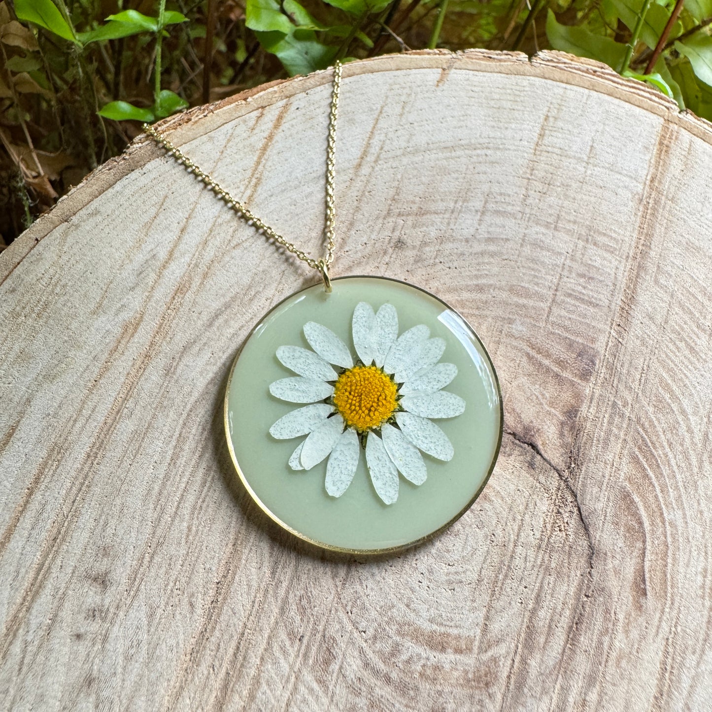 Daisy flower necklace in resin with gold filled bezel and 18-inch chain
