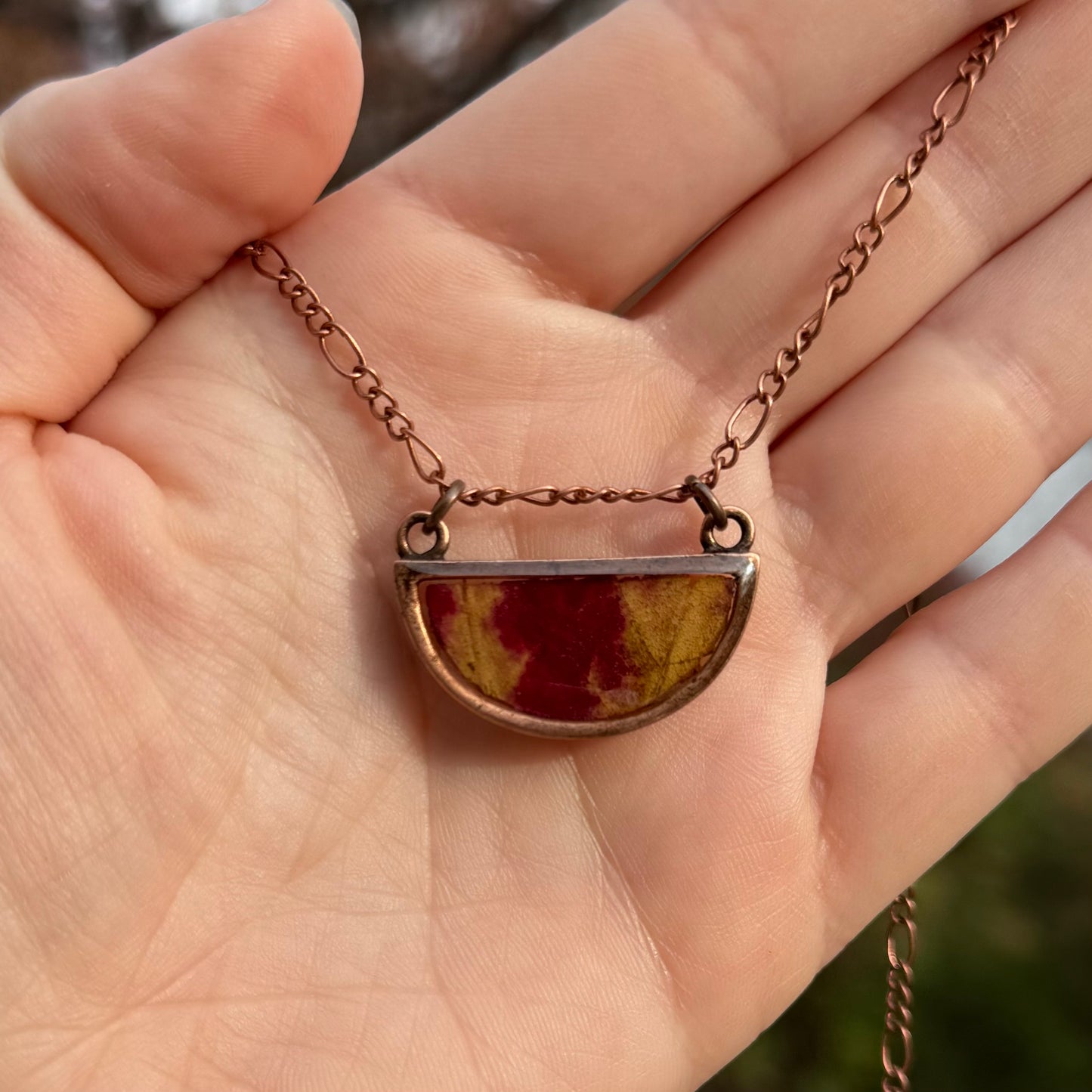 Necklace with real fall leaf preserved in resin and framed in copper bezel