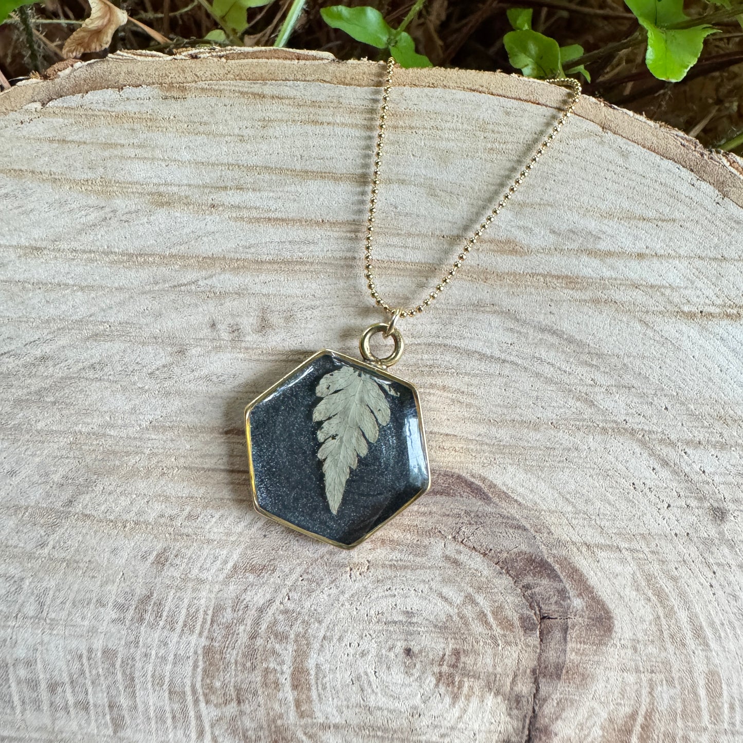 Necklace with real fern frond preserved in resin and gold filled bezel