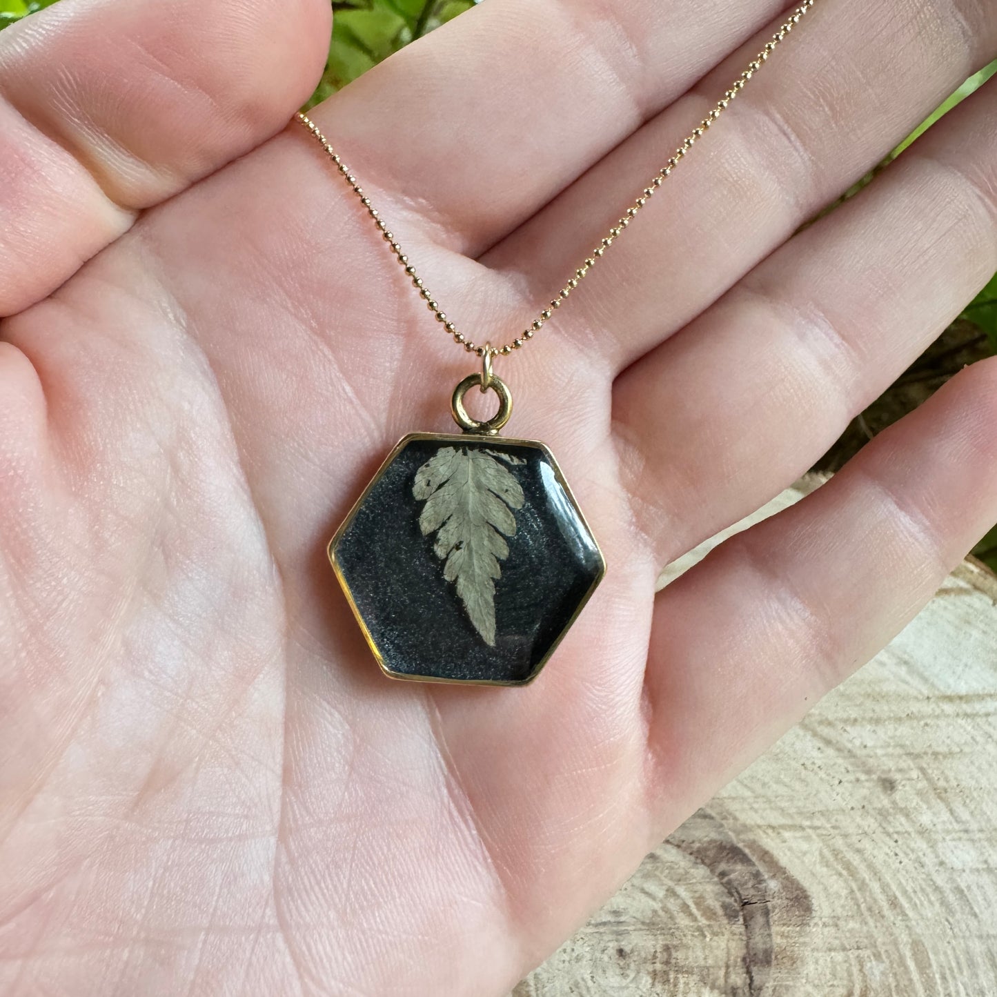 Necklace with real fern frond preserved in resin and gold filled bezel