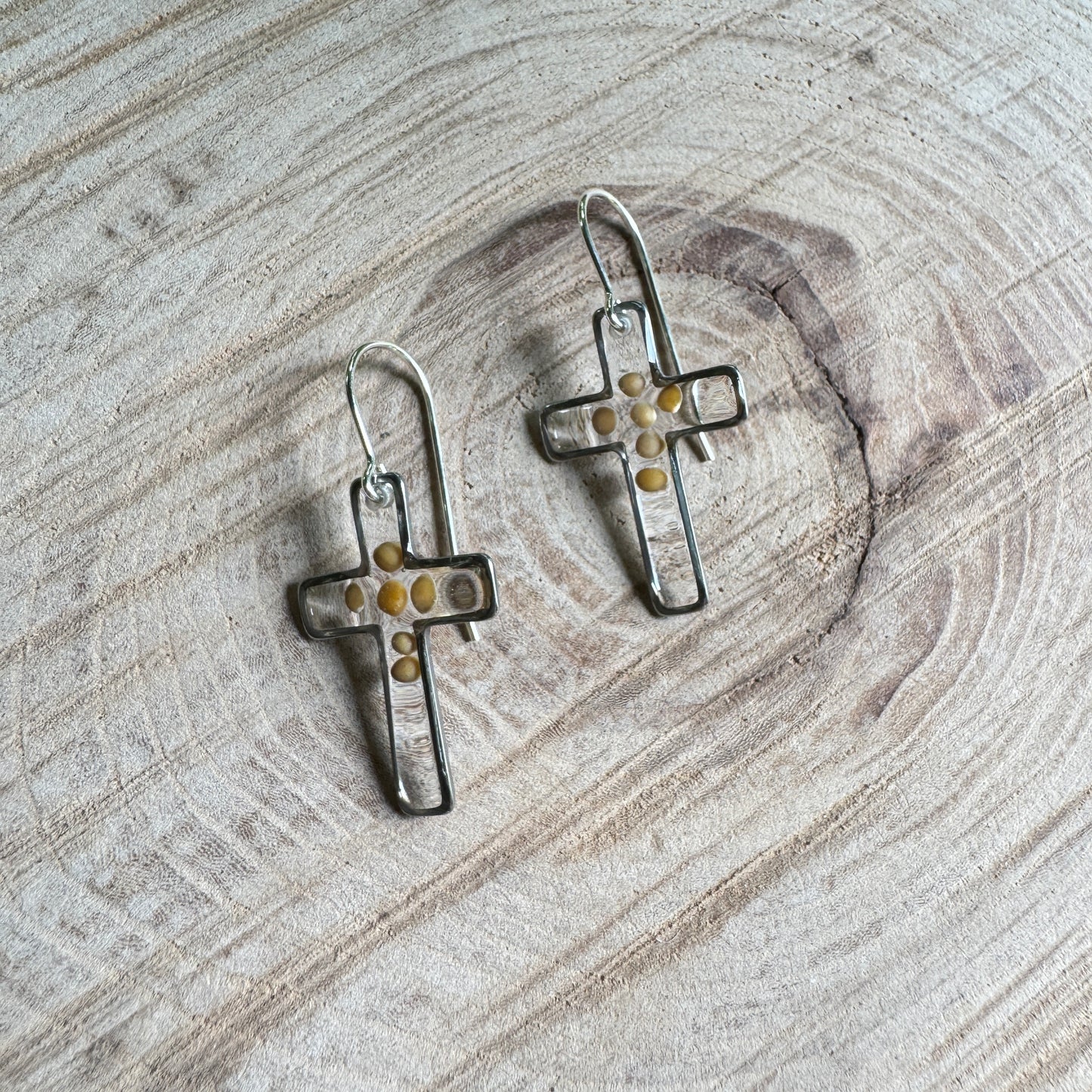 Silver cross earrings with real mustard seeds preserved in resin