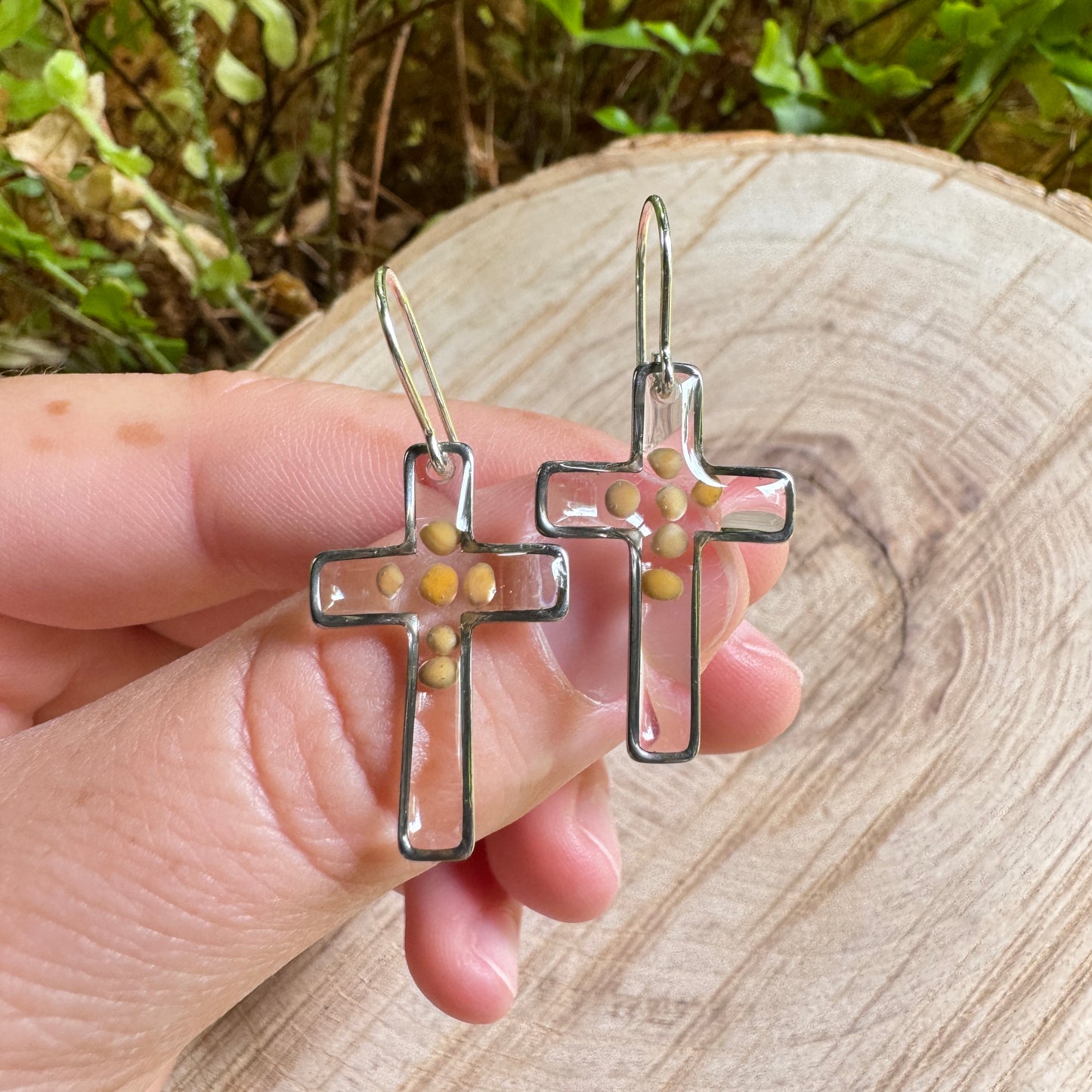 Silver cross earrings with real mustard seeds preserved in resin