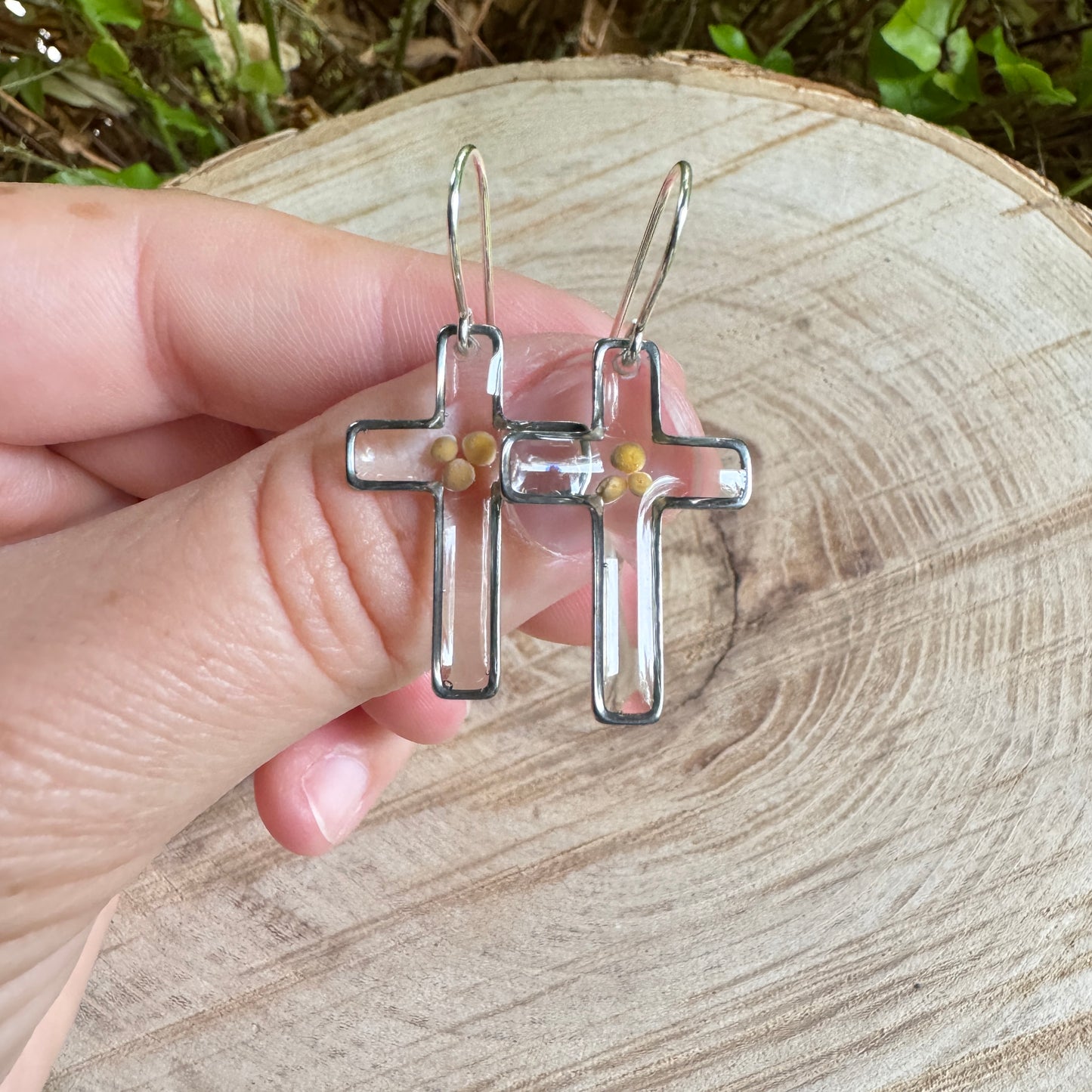 Silver cross earrings with real mustard seeds preserved in resin