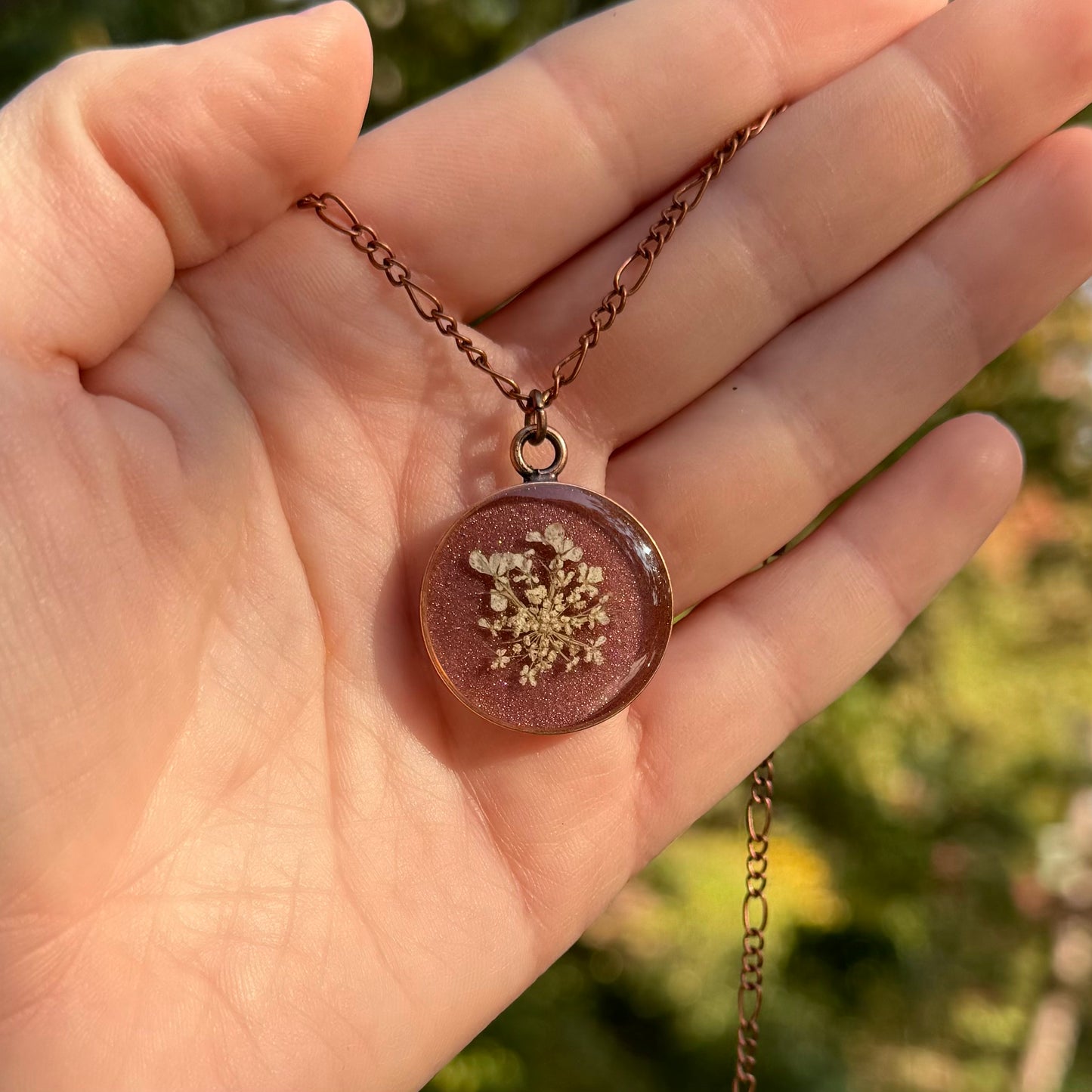 Queen Anne’s Lace necklace with real pressed flower in resin and copper bezel