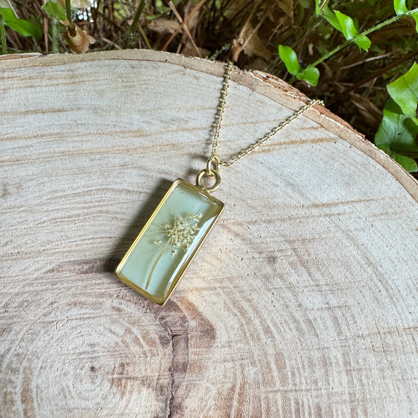 Queen Anne’s Lace necklace with real pressed flower in resin and gold filled bezel