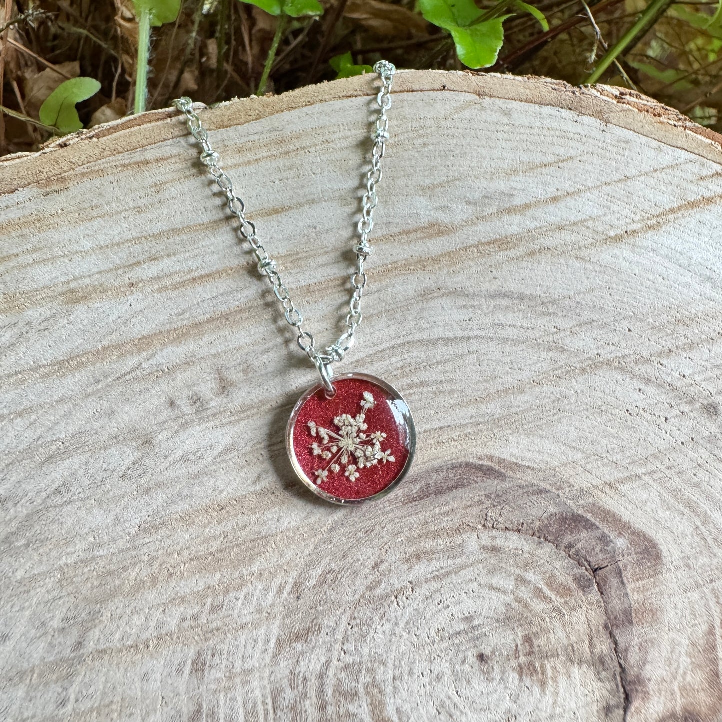 Queen Anne’s Lace necklace with real pressed flower in resin and silver bezel