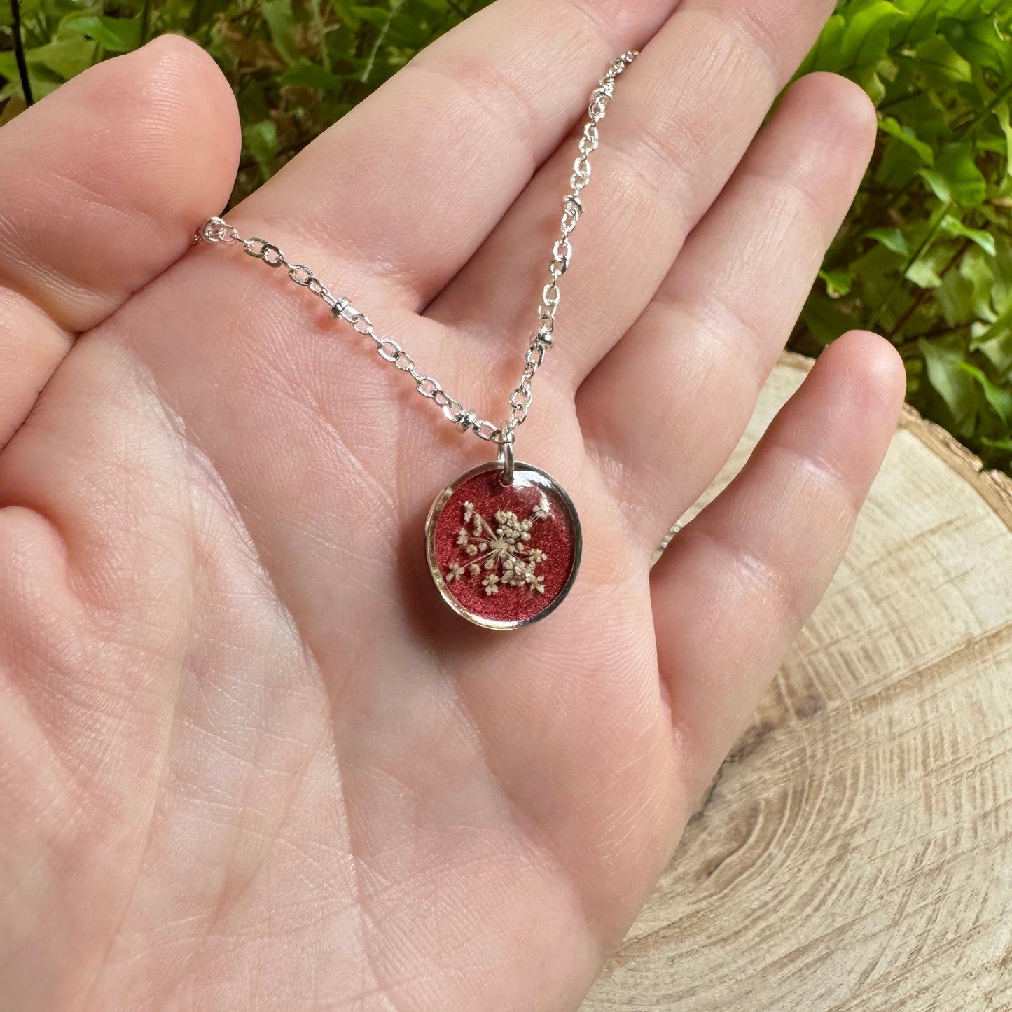 Queen Anne’s Lace necklace with real pressed flower in resin and silver bezel