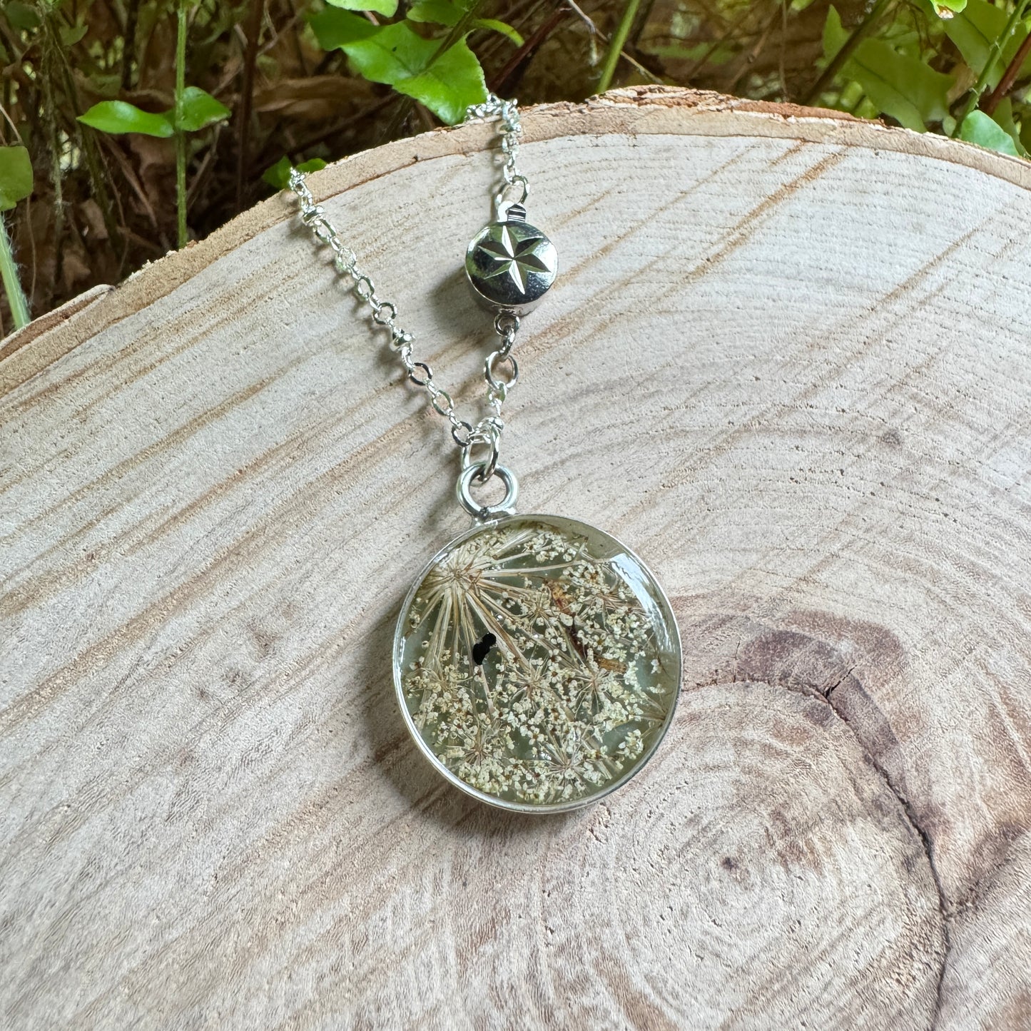 Queen Anne’s Lace necklace with real pressed flower in resin and silver bezel
