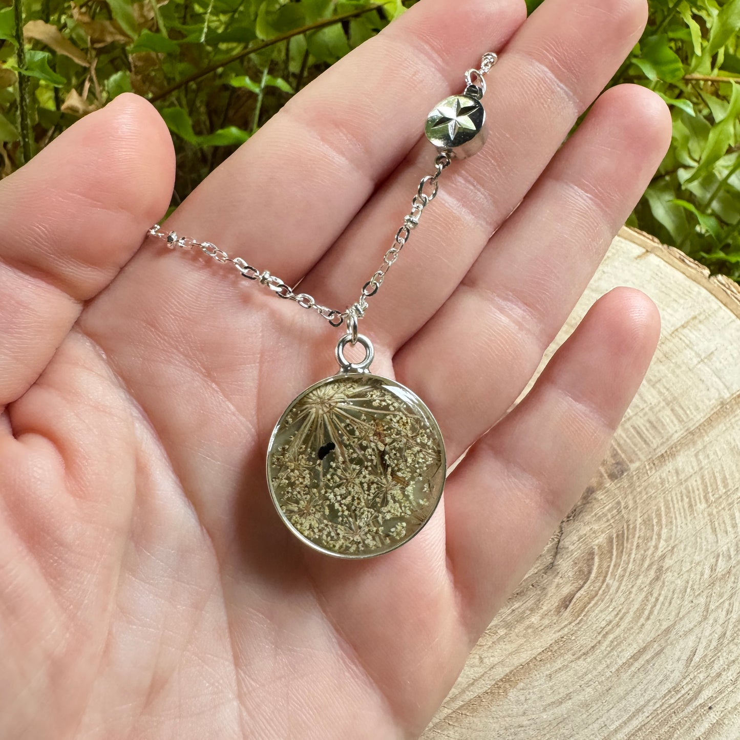 Queen Anne’s Lace necklace with real pressed flower in resin and silver bezel