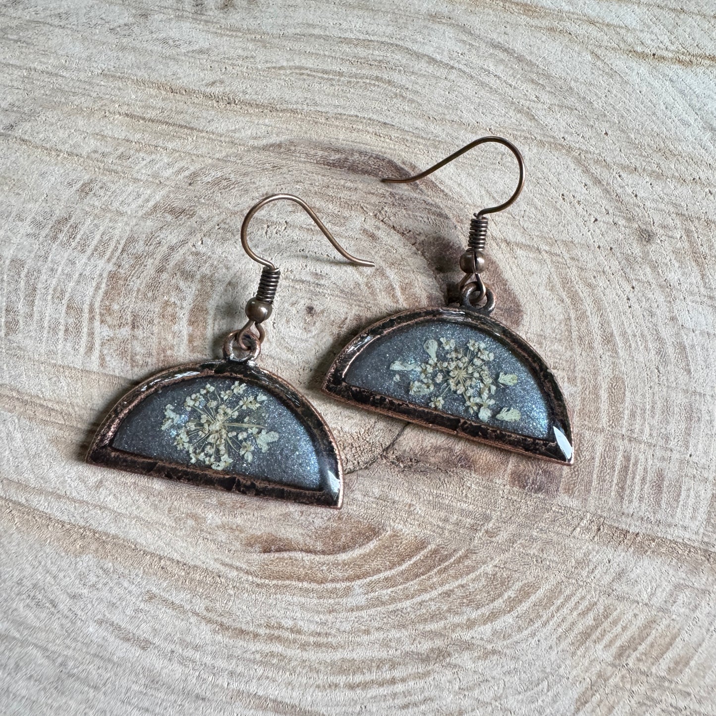 Queen Anne’s Lace flower earrings preserved in resin with copper bezel