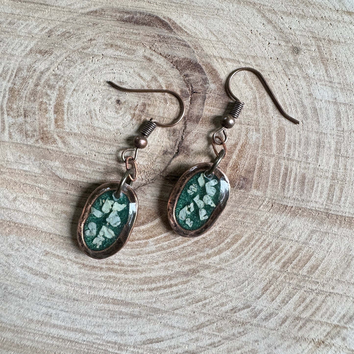 Queen Anne’s Lace flower earrings preserved in resin with copper bezel
