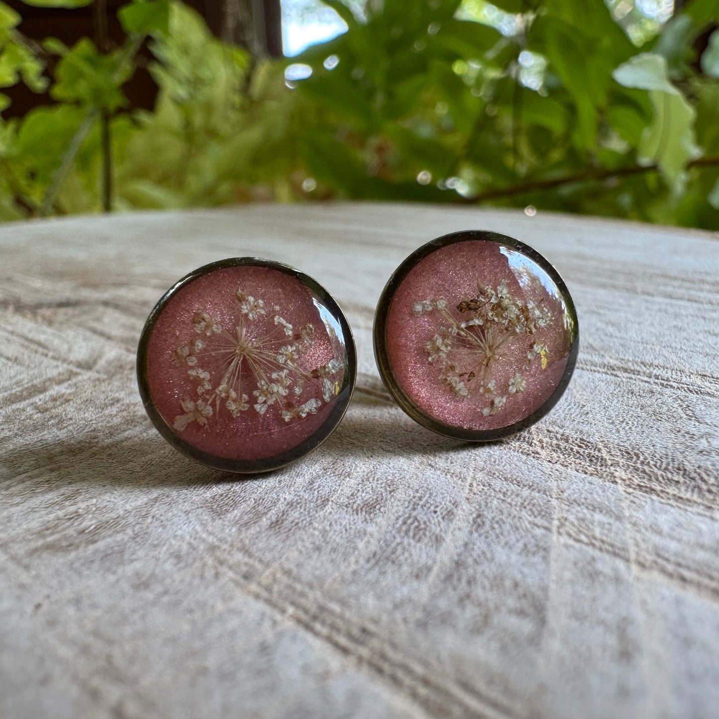 Queen Anne’s Lace flower earrings preserved in resin with copper bezel