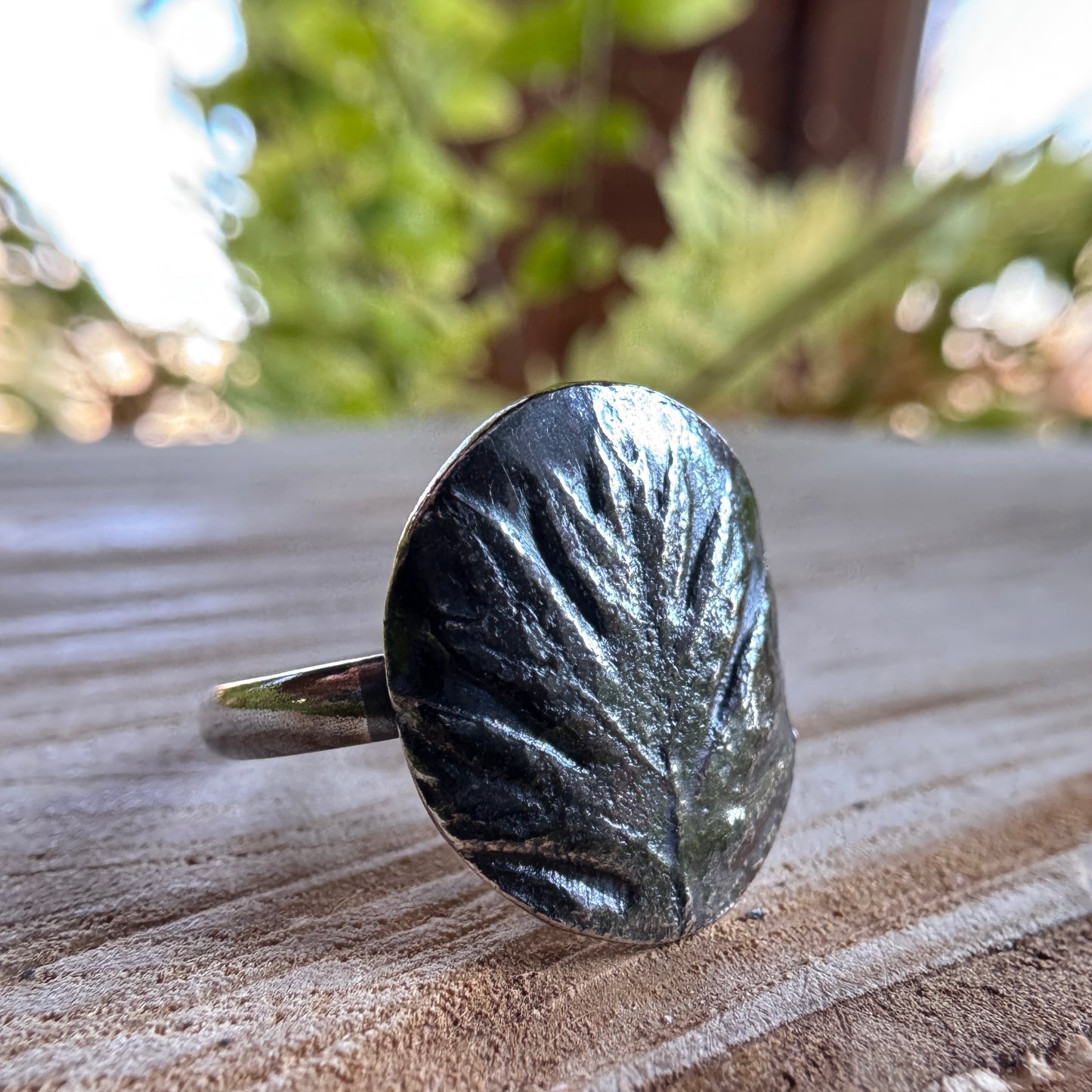 Handmade oak leaf ring in silver with textured botanical detail