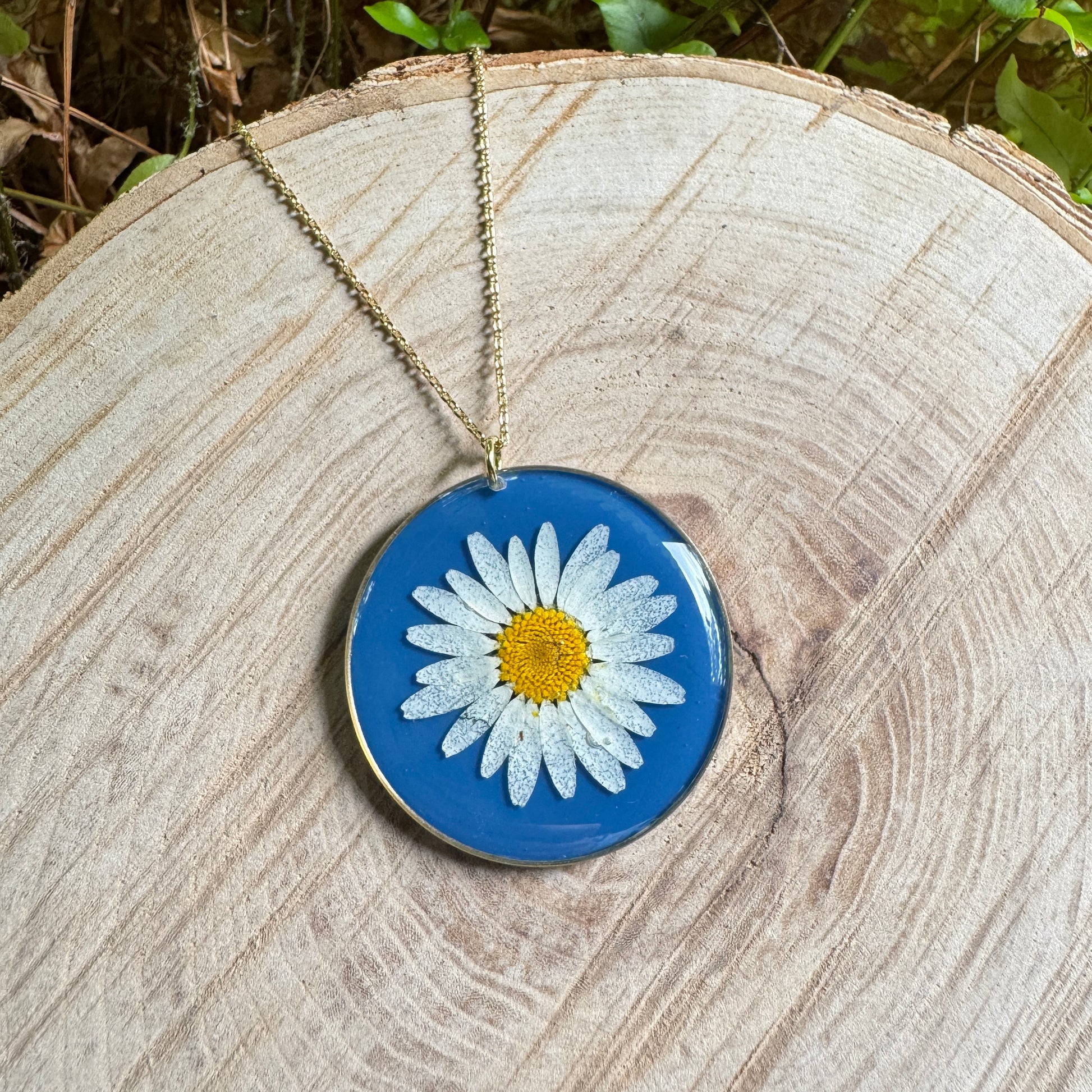 Daisy flower necklace in resin with gold filled bezel and 18-inch chain