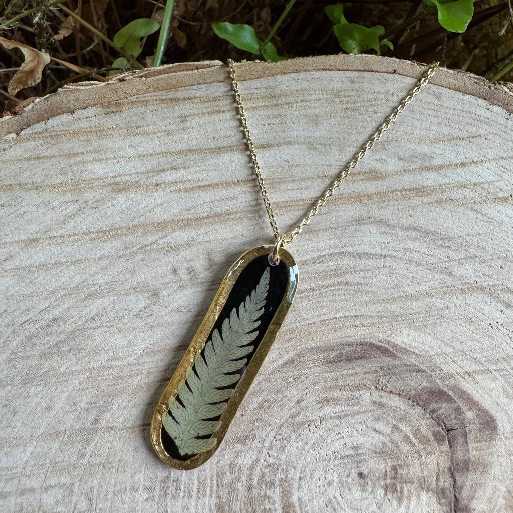 Necklace with real fern frond preserved in resin and gold filled bezel