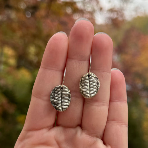 Fern fossil earrings with botanical texture in fine silver