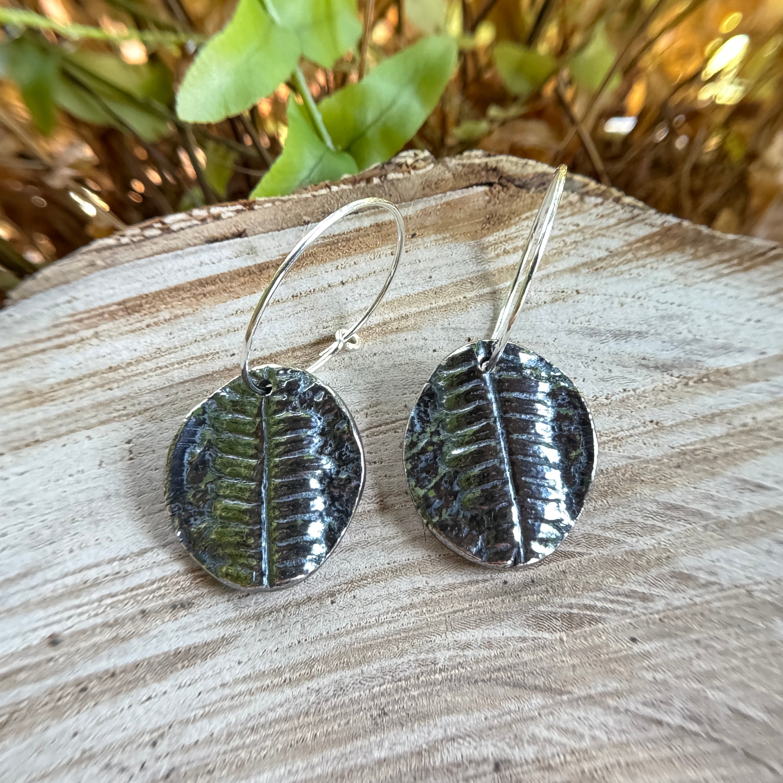 Fern fossil earrings with botanical texture in fine silver