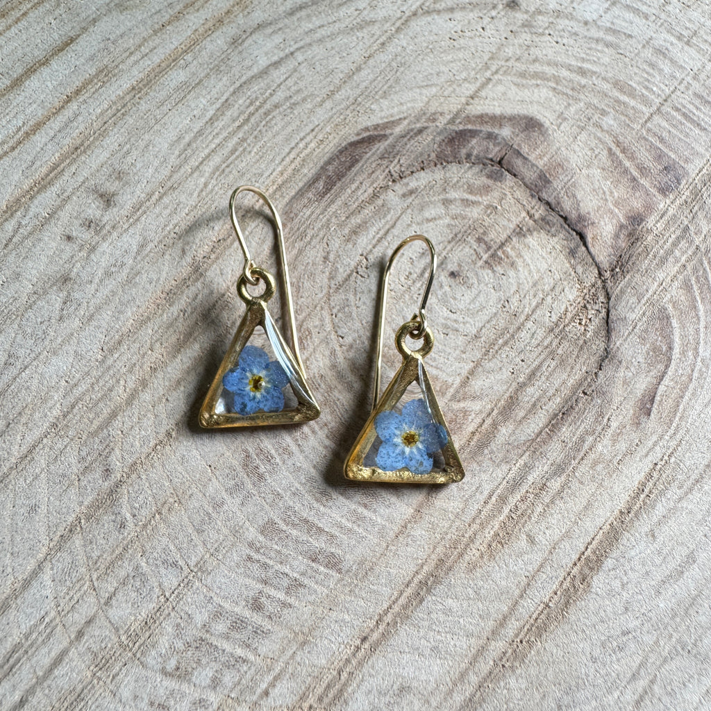 Earrings with real forget-me-not flowers preserved in resin and set in gold filled bezels