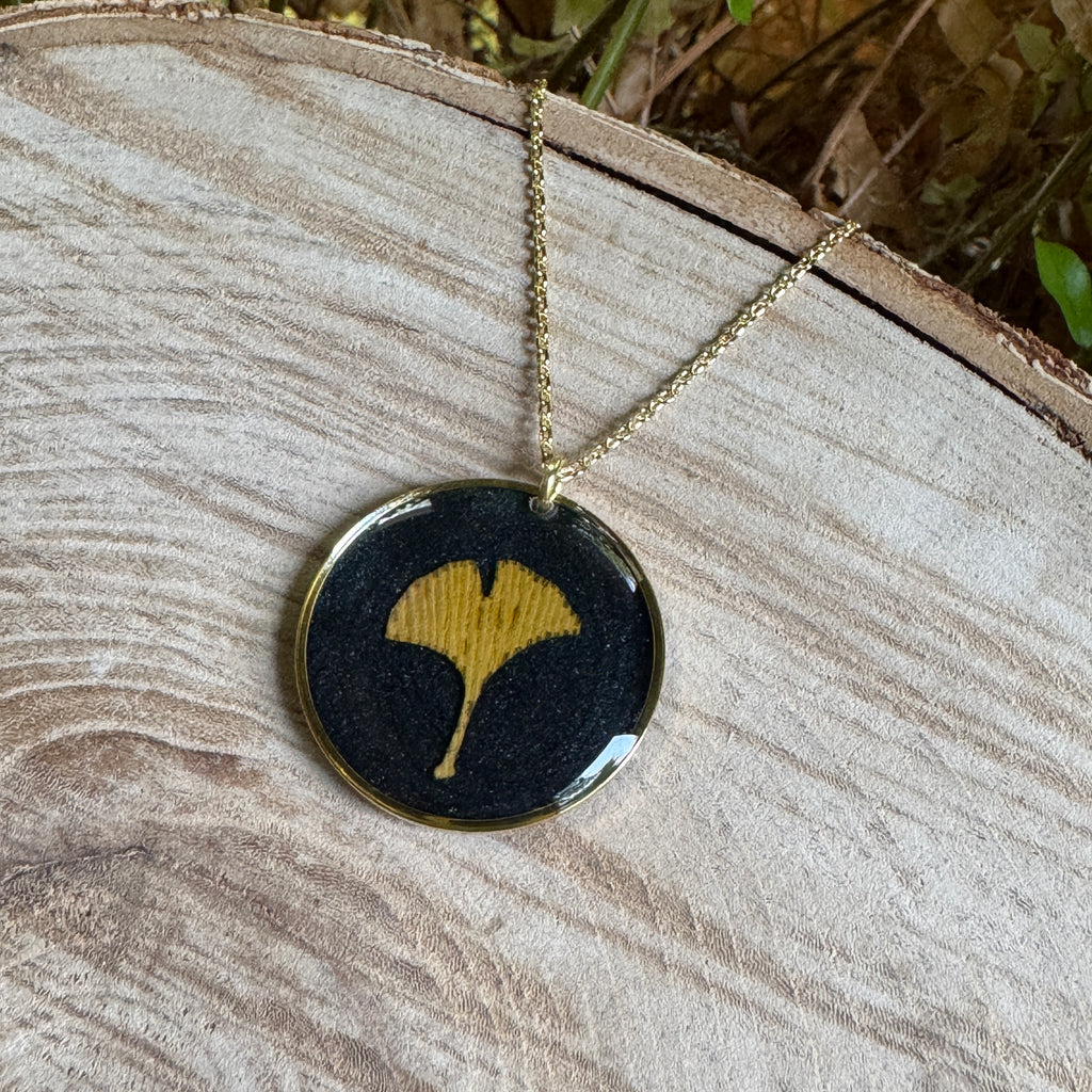 Handcrafted ginkgo leaf necklace in gold filled with organic botanical detail