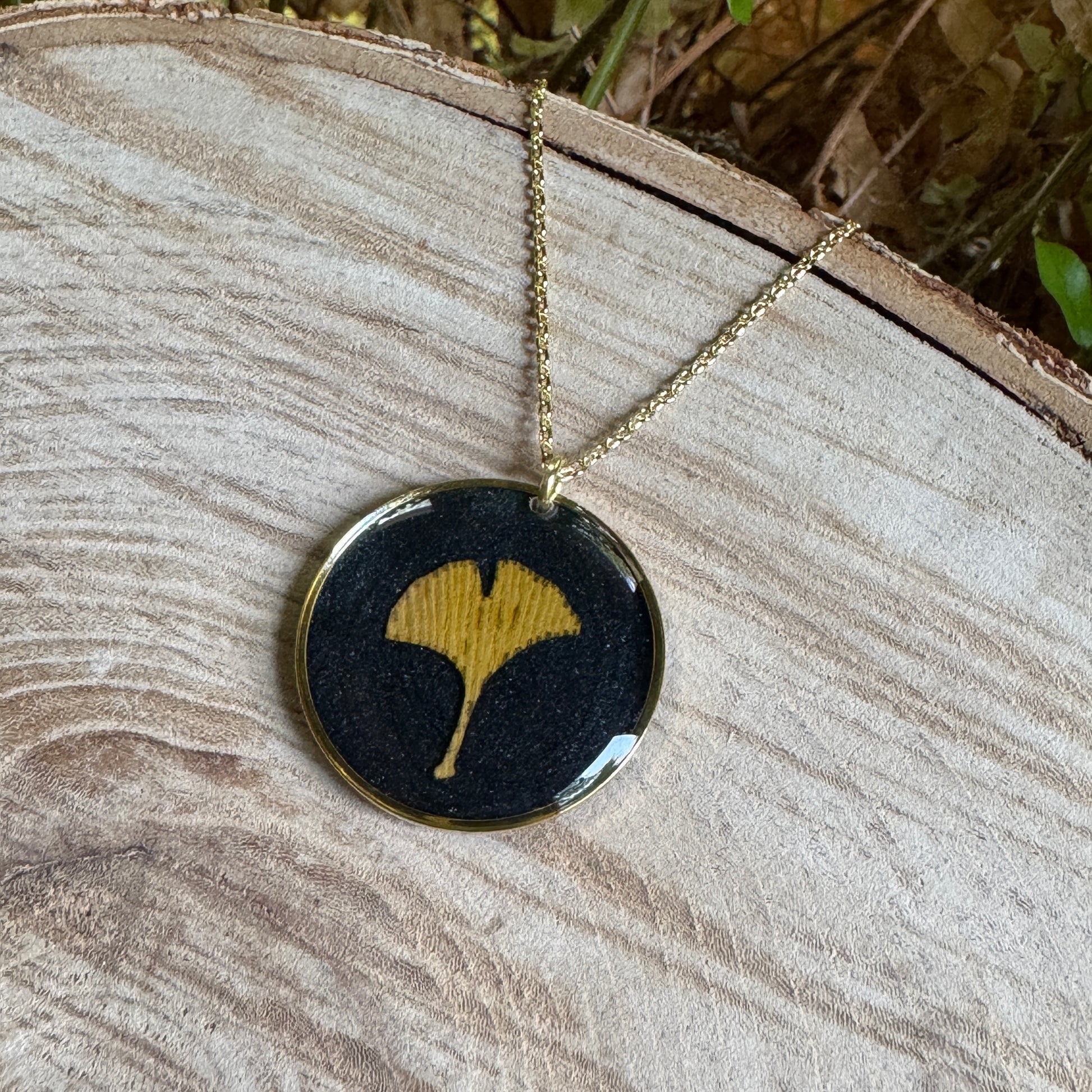 Handcrafted ginkgo leaf necklace in gold filled with organic botanical detail