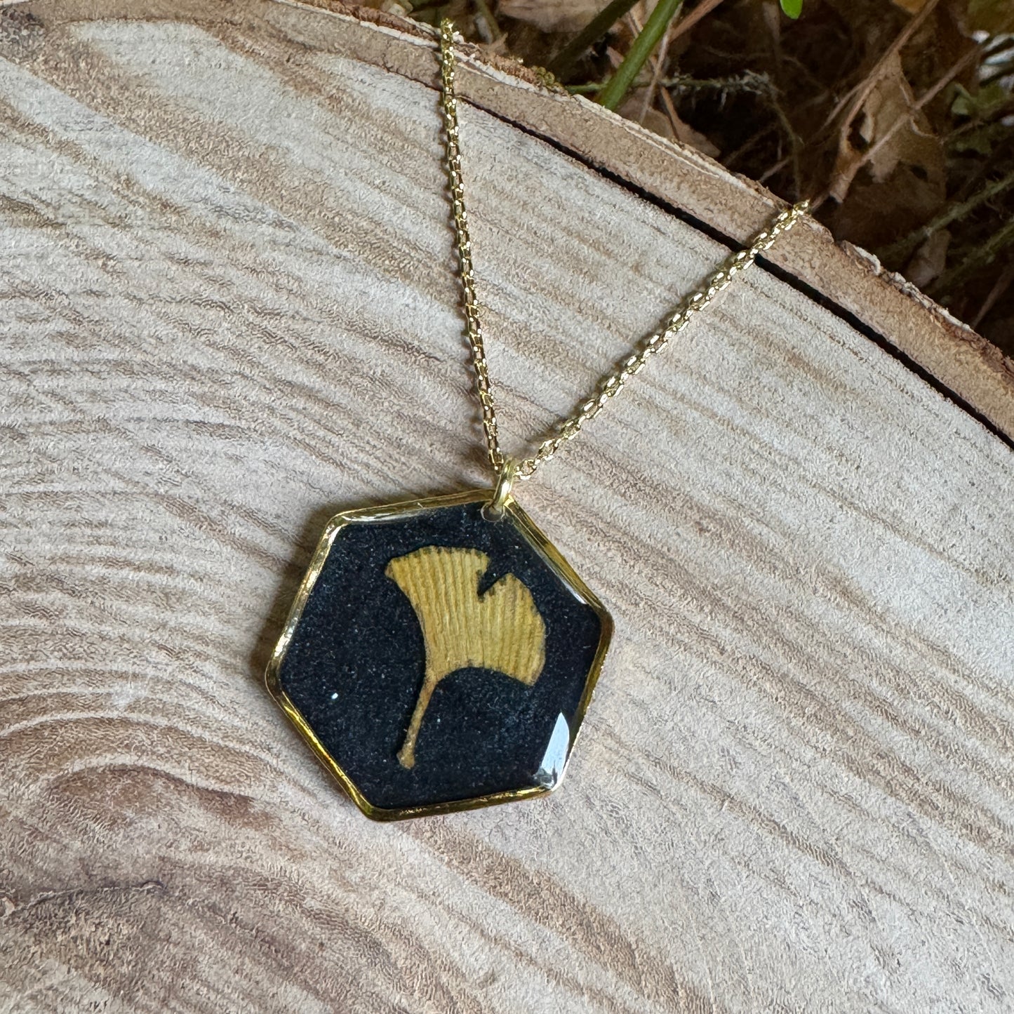 Handcrafted ginkgo leaf necklace in gold filled with organic botanical detail