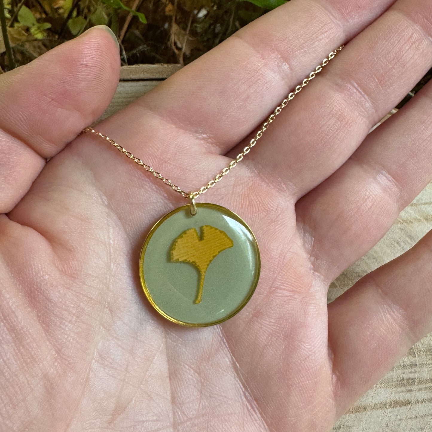 Handcrafted ginkgo leaf necklace in gold filled with organic botanical detail