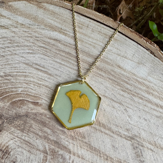 Handcrafted ginkgo leaf necklace in gold filled with organic botanical detail