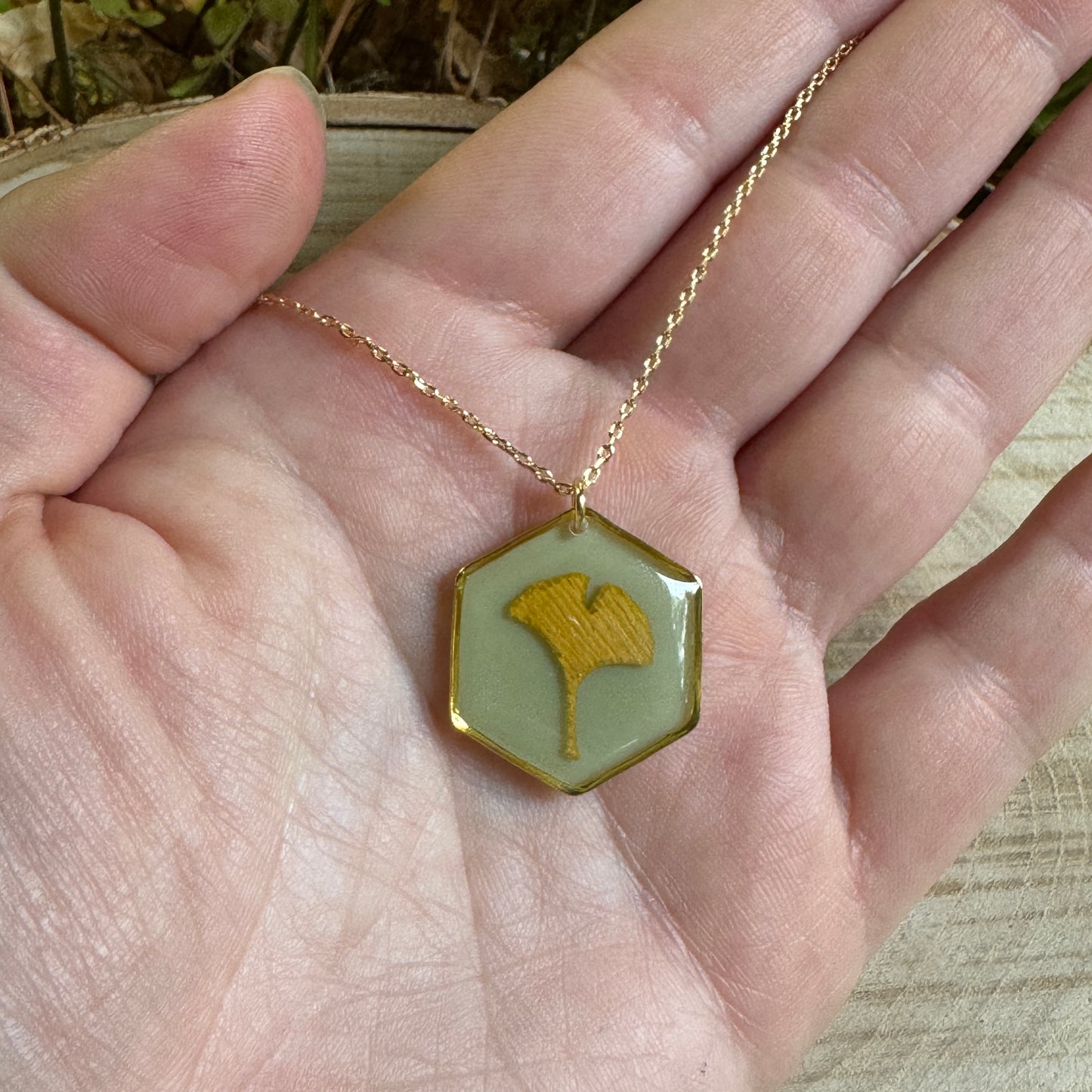 Handcrafted ginkgo leaf necklace in gold filled with organic botanical detail