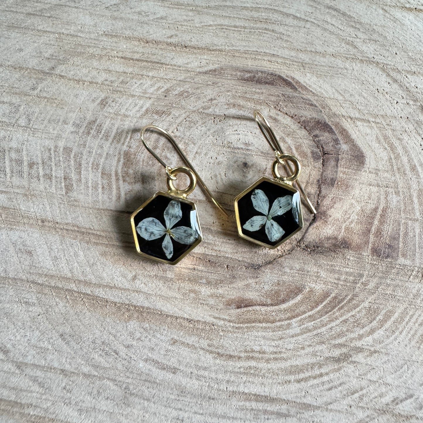 Earrings with real hydrangea petals preserved in resin and gold filled bezels