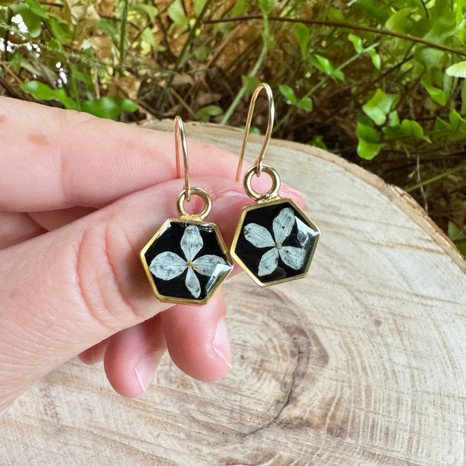 Earrings with real hydrangea petals preserved in resin and gold filled bezels