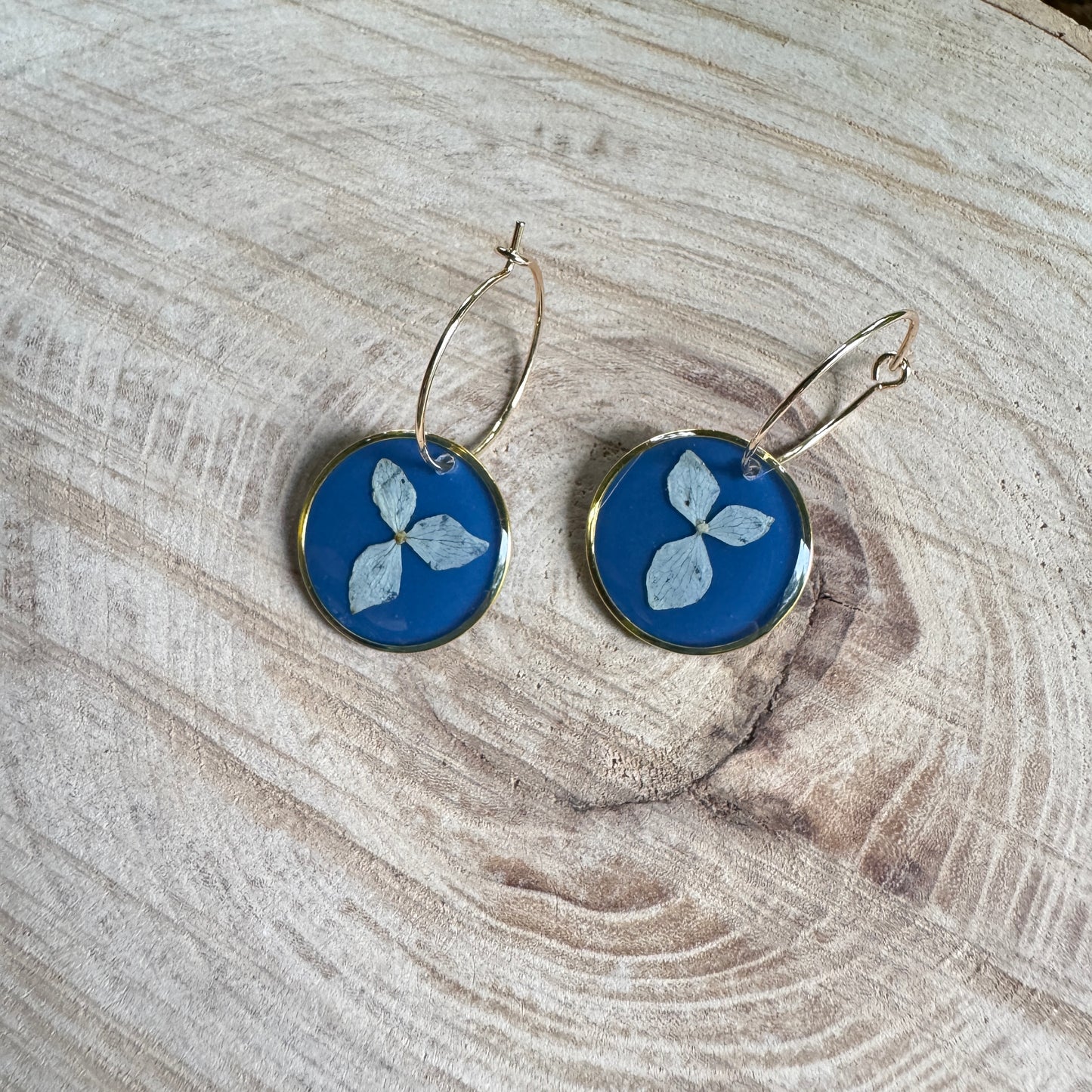 Earrings with real hydrangea petals preserved in resin and gold filled bezels