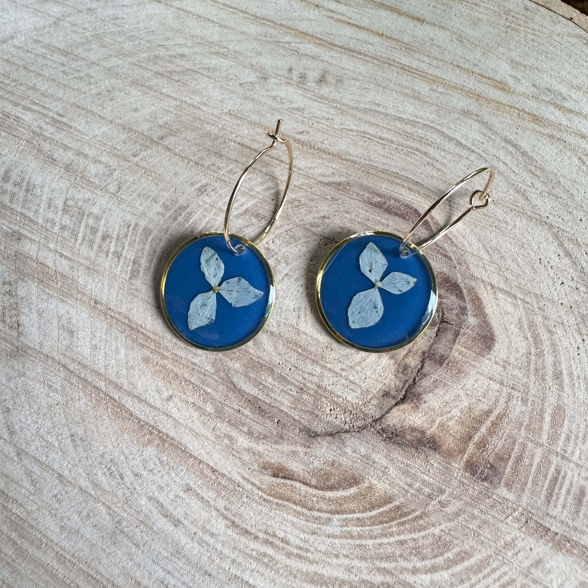 Earrings with real hydrangea petals preserved in resin and gold filled bezels