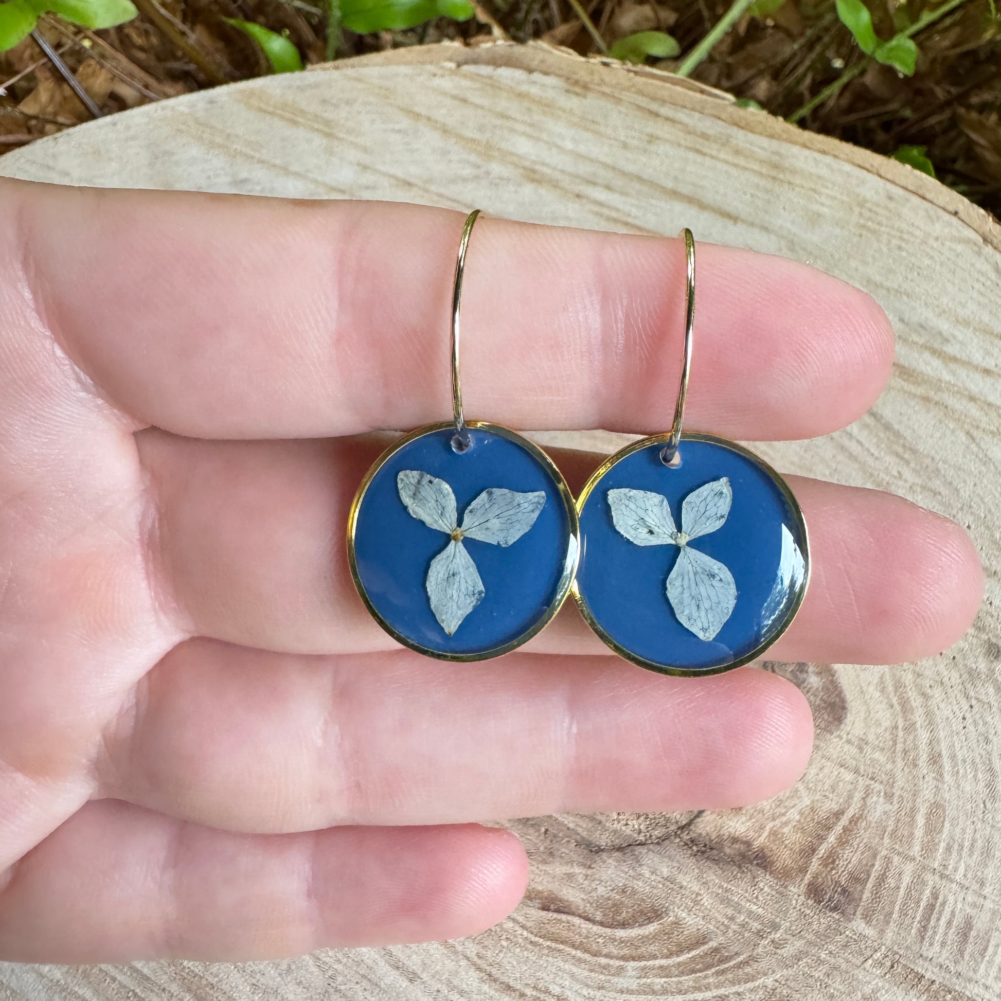 Earrings with real hydrangea petals preserved in resin and gold filled bezels