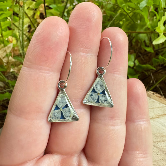 Earrings with real hydrangea petals preserved in resin and silver bezels