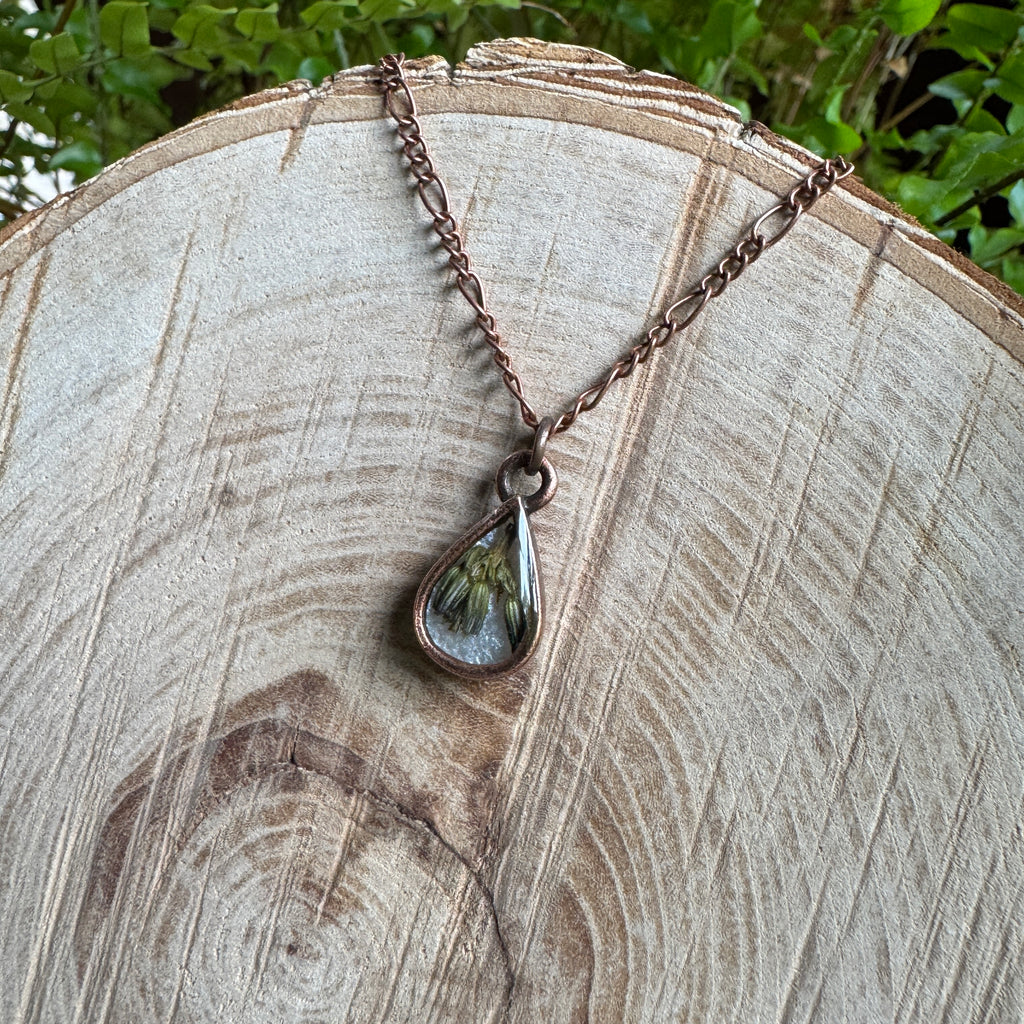 Handmade real lavender teardrop necklace featuring preserved lavender in resin with Morning Mist white background, available in antique copper.