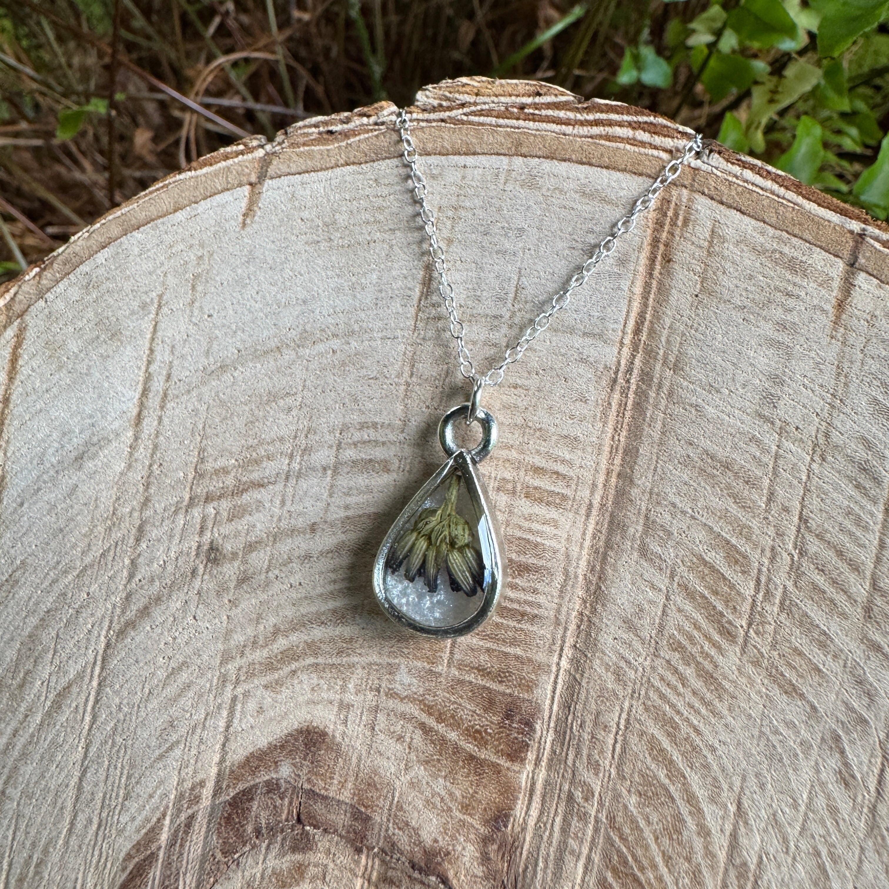 Handmade real lavender teardrop necklace featuring preserved lavender in resin with Morning Mist white background, available in sterling silver.