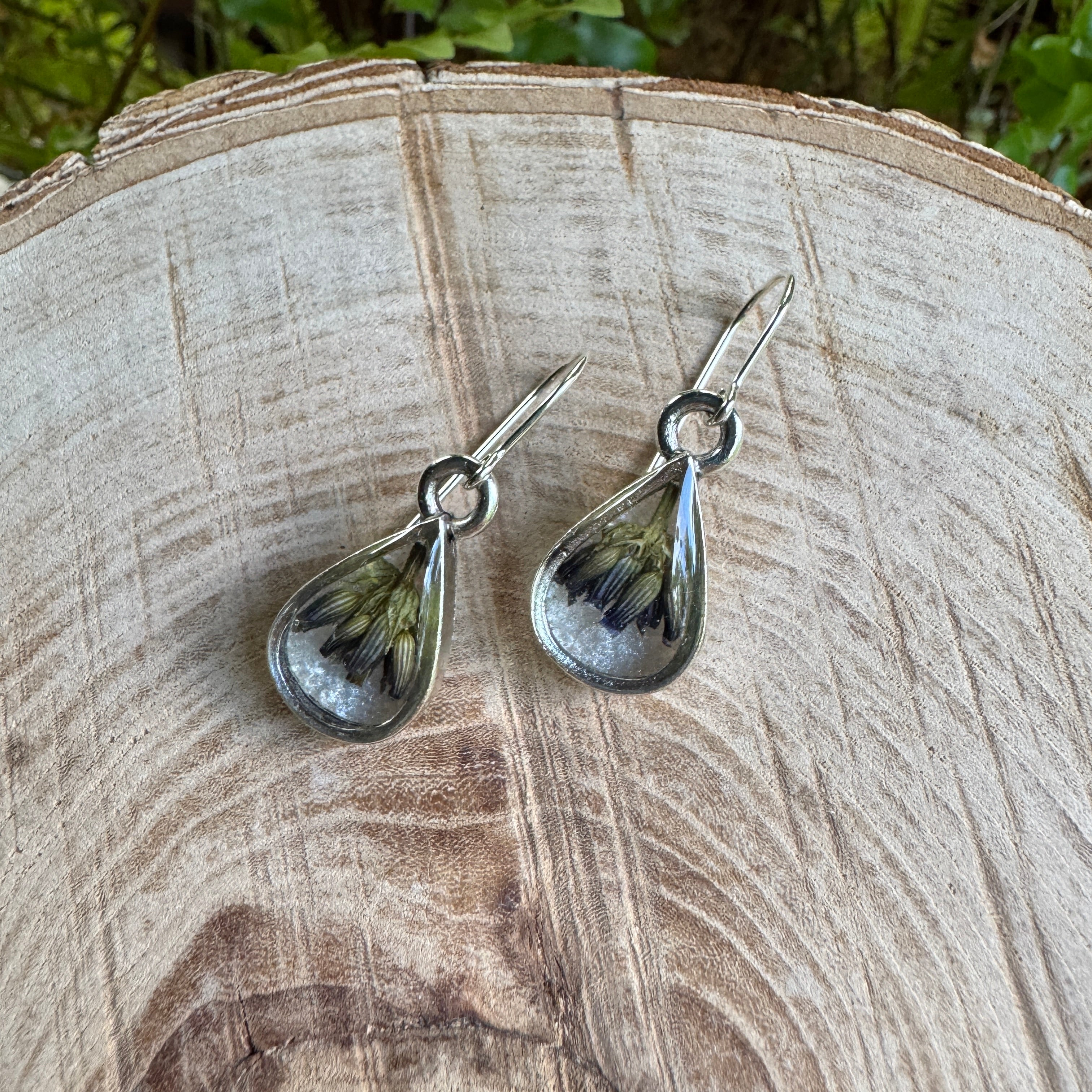 Handmade real lavender teardrop earrings featuring preserved lavender in resin, available in sterling silver.