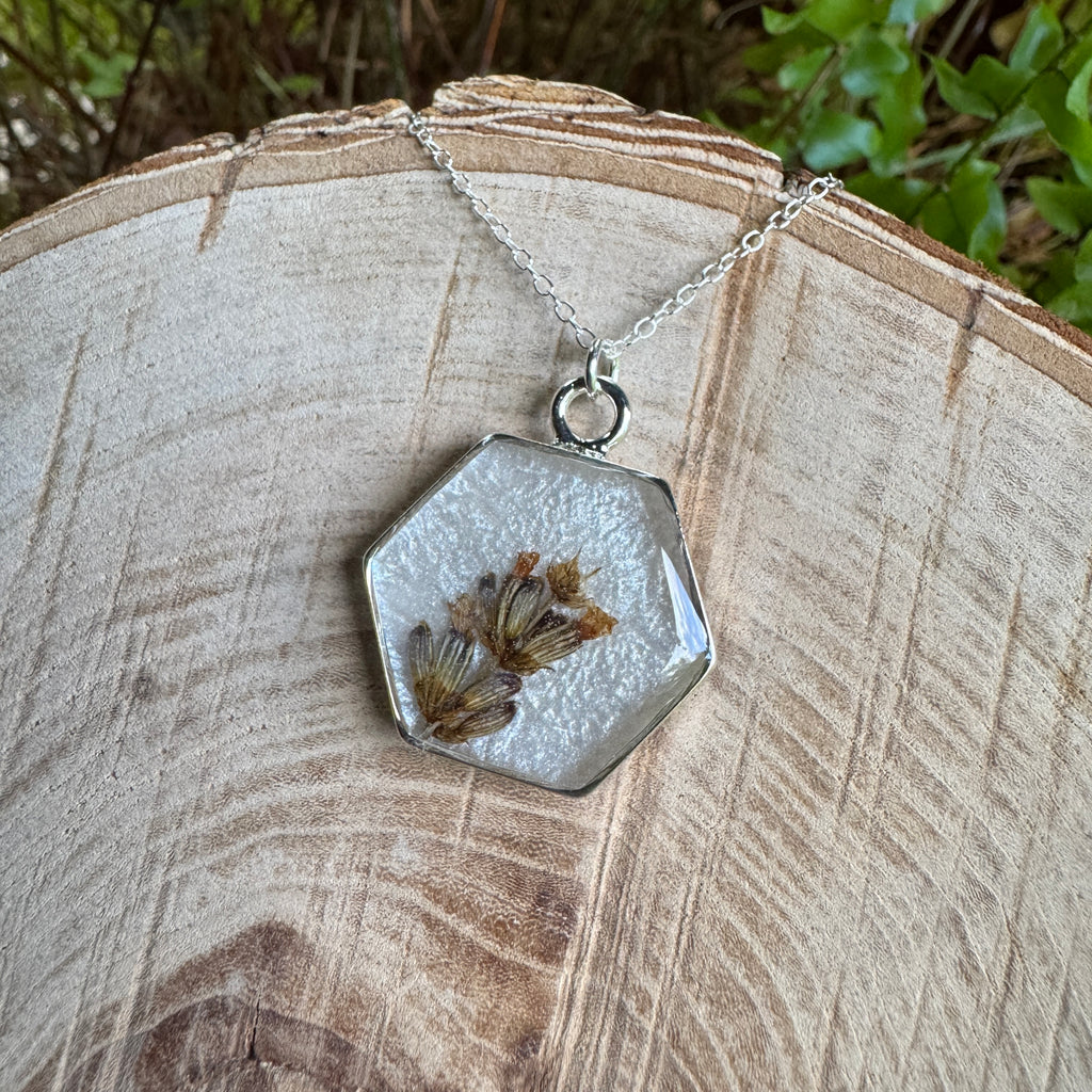 Handmade real lavender hexagon necklace featuring preserved lavender in resin with a Morning Mist white background, available in sterling silver.