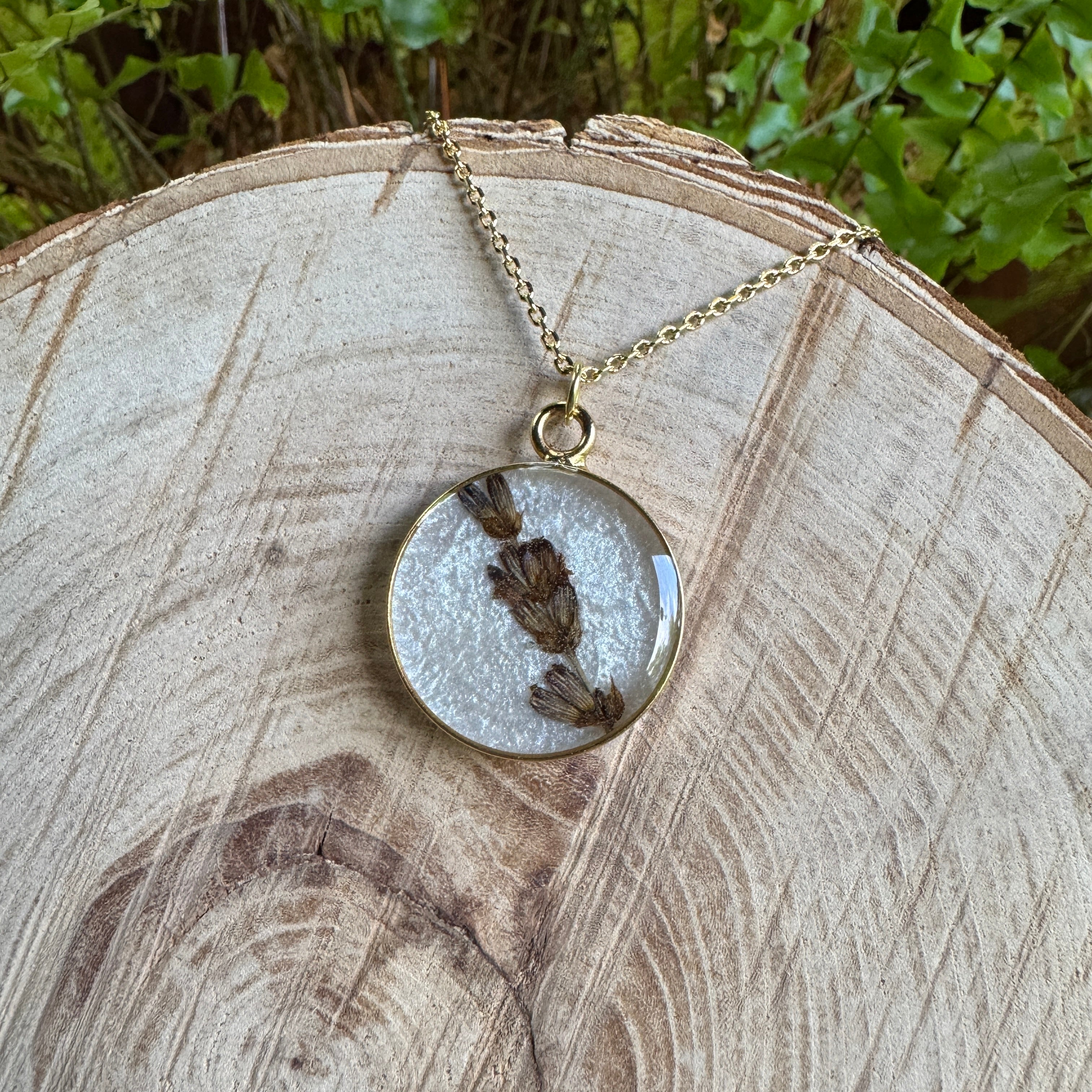 Handmade real lavender circle necklace with preserved lavender in resin, available in Morning Mist white background in gold filled.
