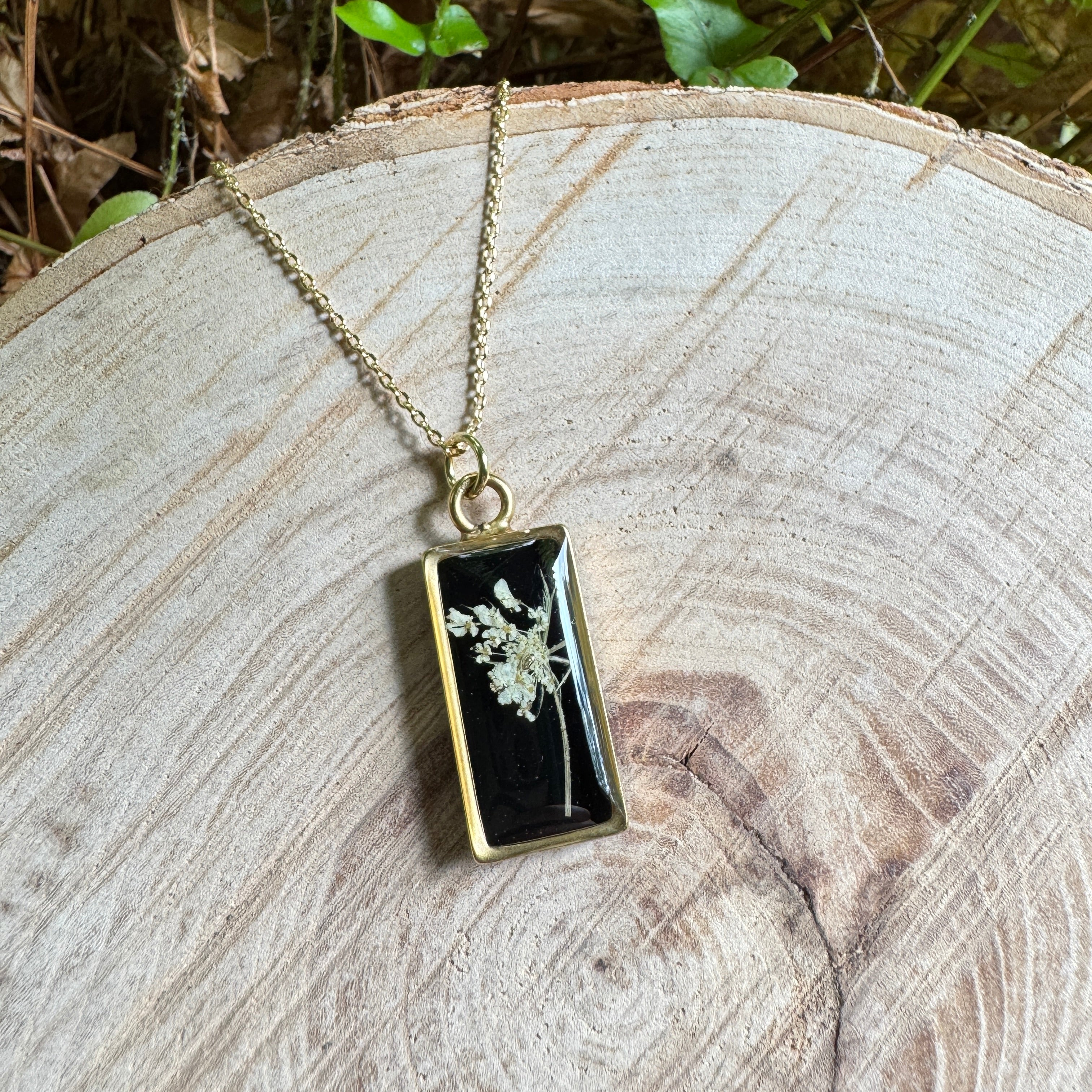 Queen Anne’s Lace necklace with real pressed flower in resin and gold filled bezel