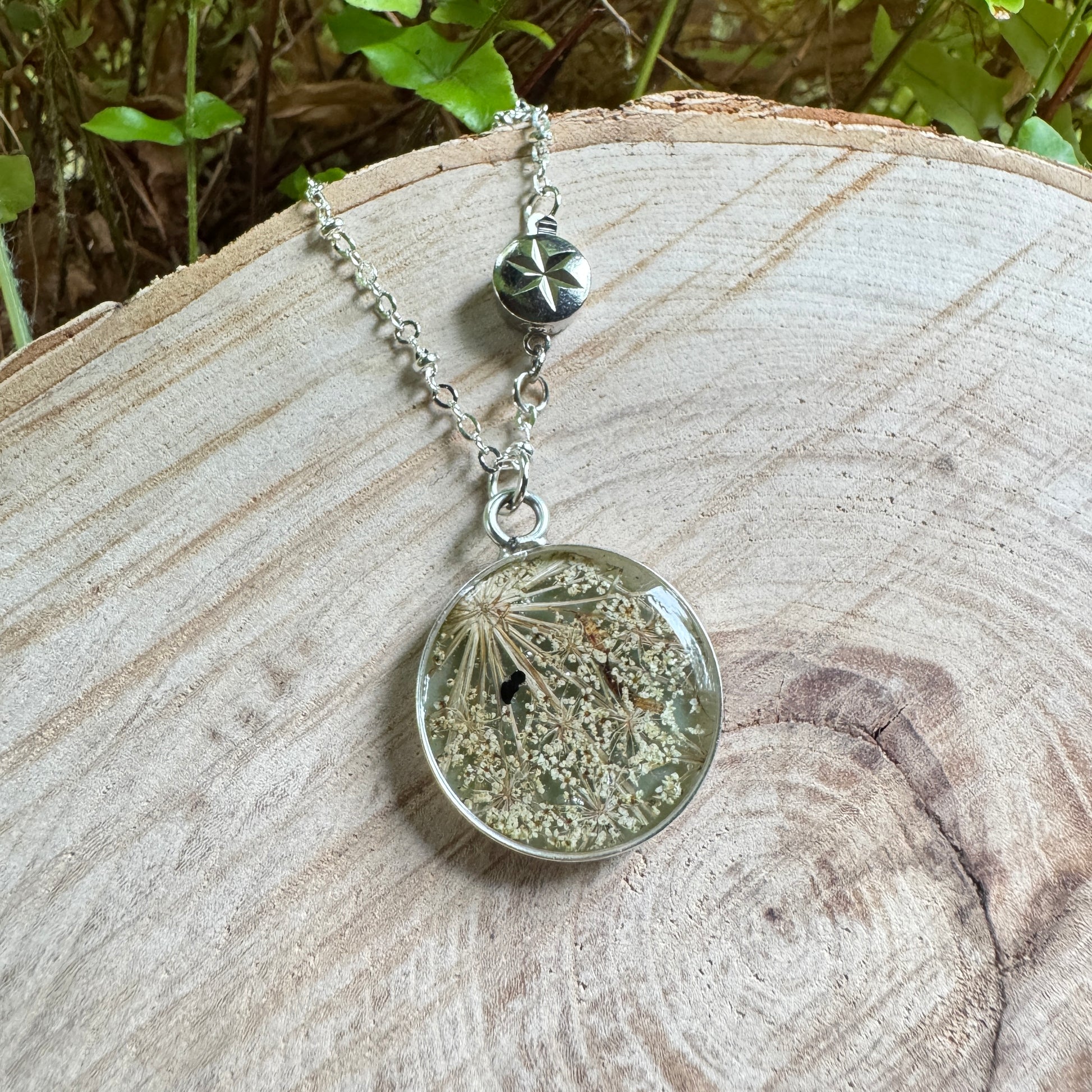 Queen Anne’s Lace necklace with real pressed flower in resin and silver bezel