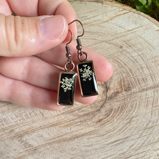 Queen Anne’s Lace flower earrings preserved in resin with copper bezel