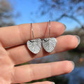Silver ivy leaf earrings with sculpted detail and botanical shape