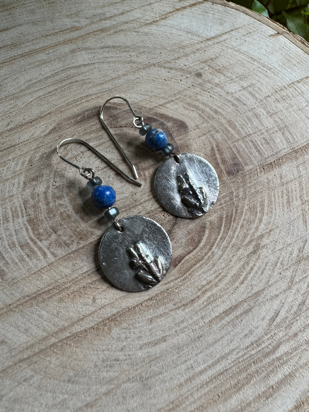 Sculpted silver lavender earrings with detailed botanical design