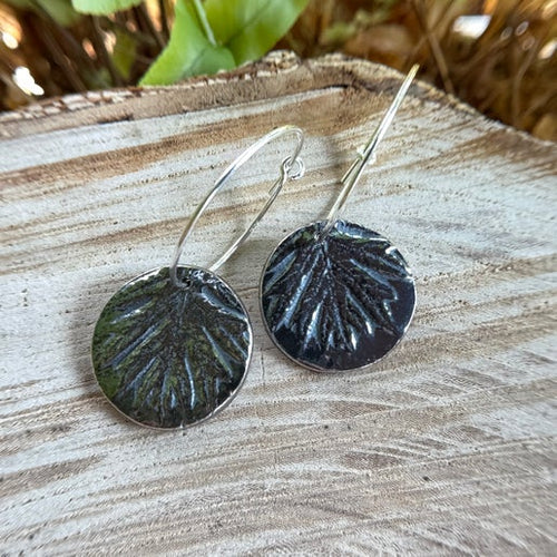 Handcrafted oak leaf earrings in silver with detailed natural texture