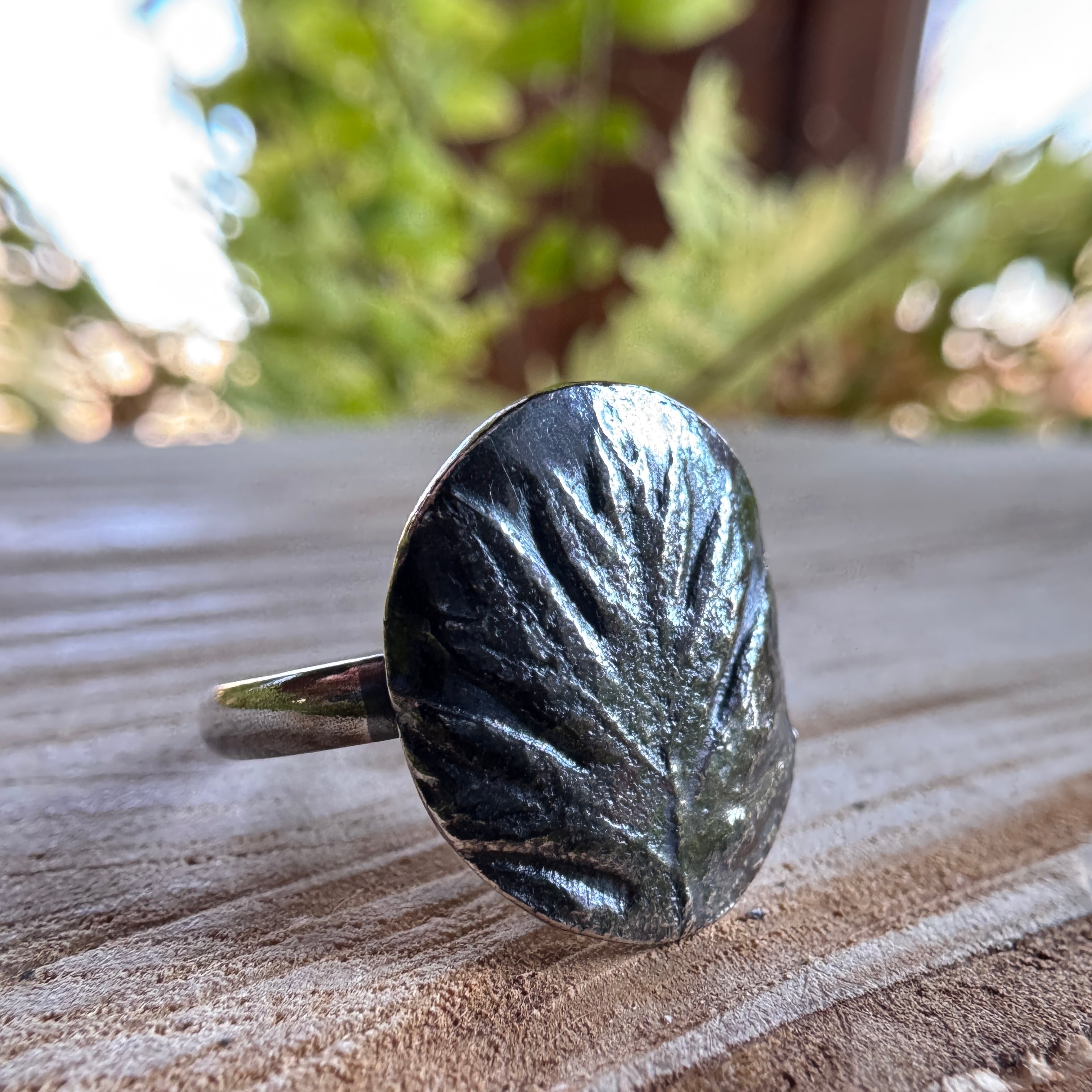 Handmade oak leaf ring in silver with textured botanical detail