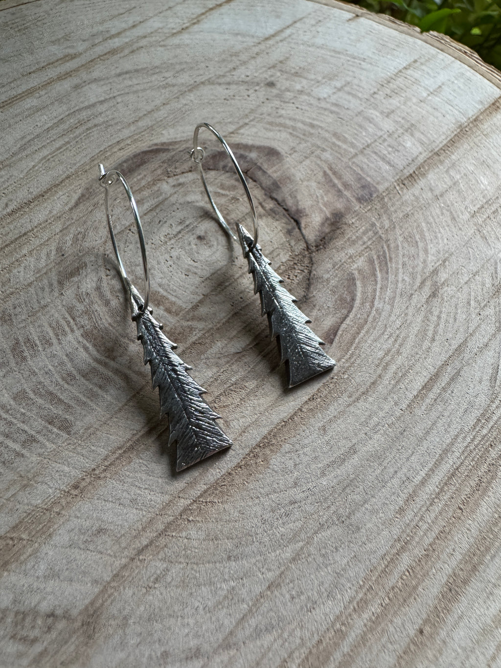 Silver pine tree earrings with handcrafted forest silhouette design