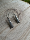 Silver pine tree earrings with handcrafted forest silhouette design
