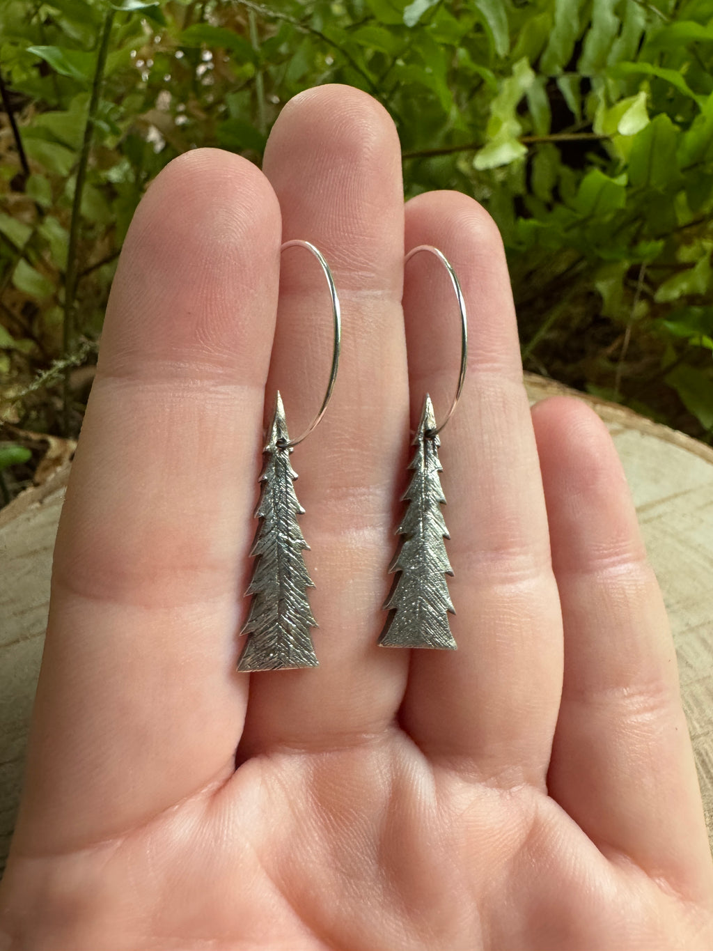 Silver pine tree earrings with handcrafted forest silhouette design